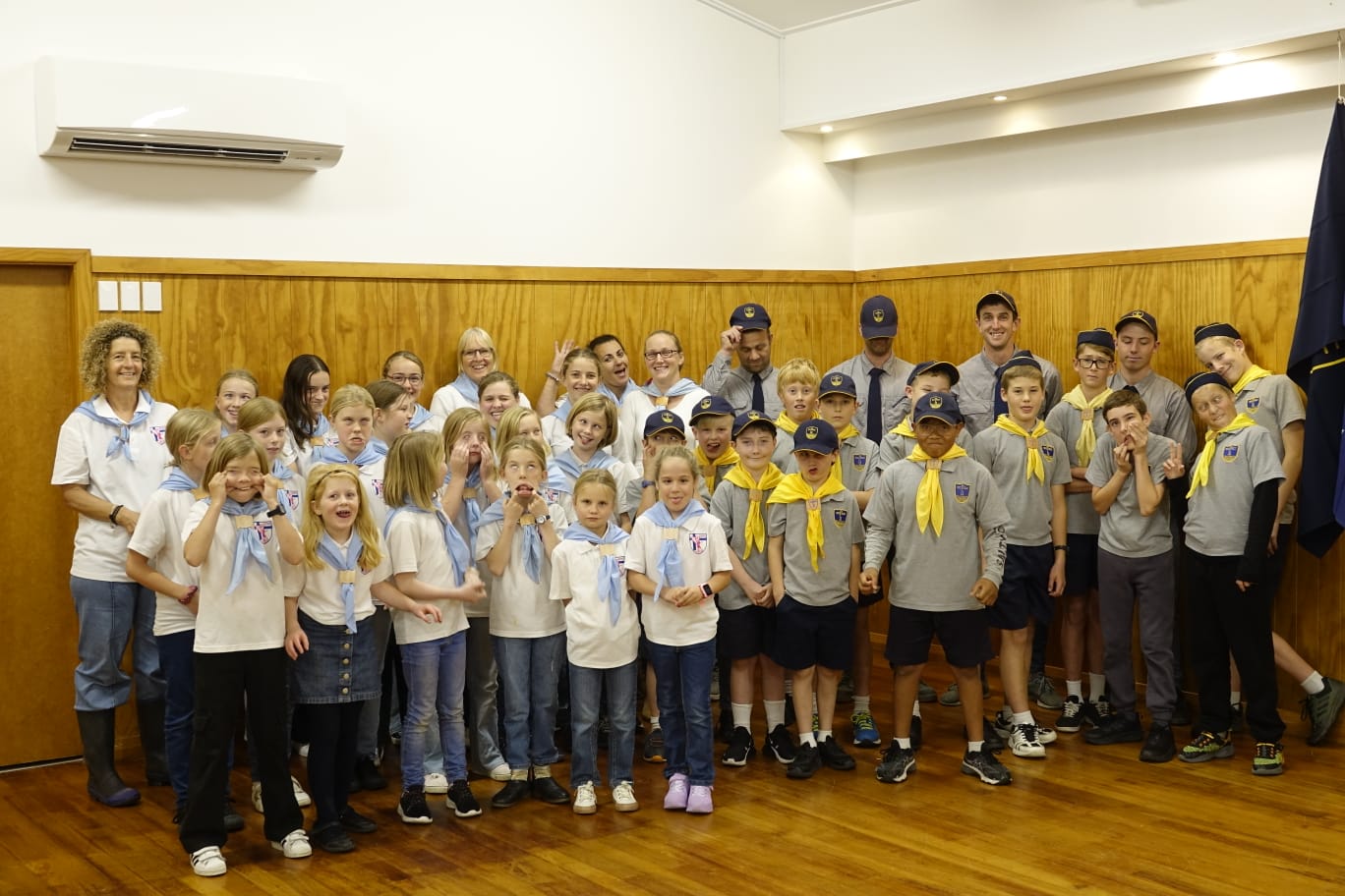 people sitting on green grass field during daytime