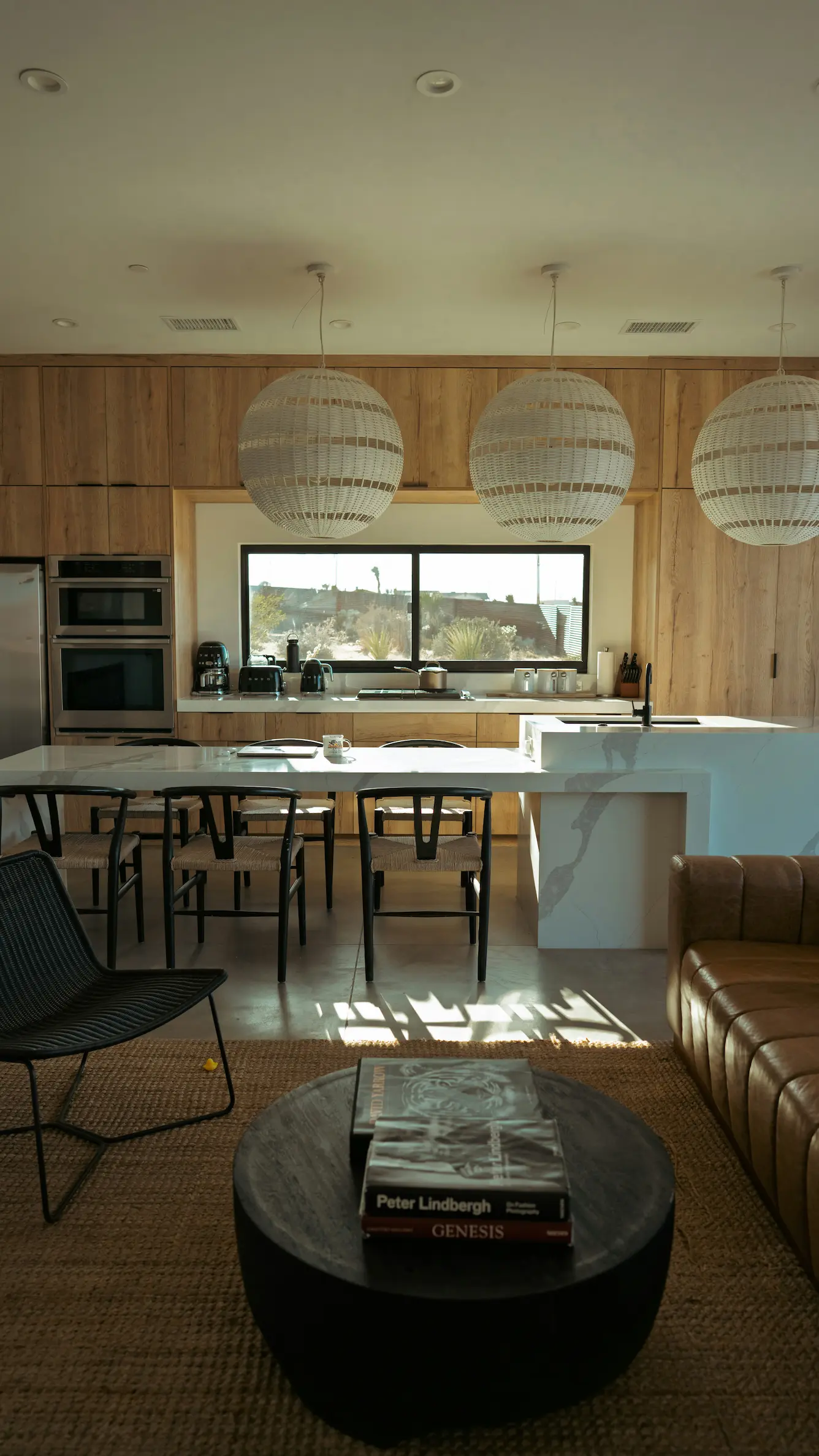 Residential kitchen with yellow light through the window