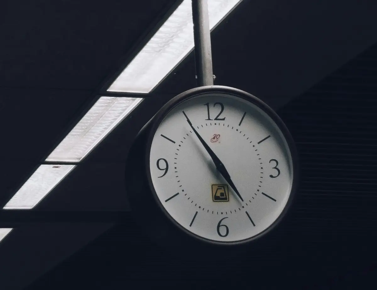 analog clock at 5:55