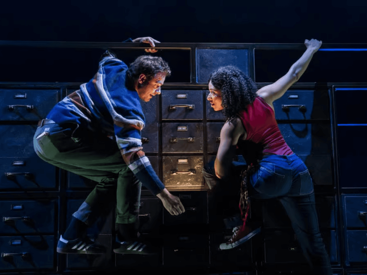 Lost Atoms at London's Lyric Hammersmith  poster with two faces reflected in broken glass