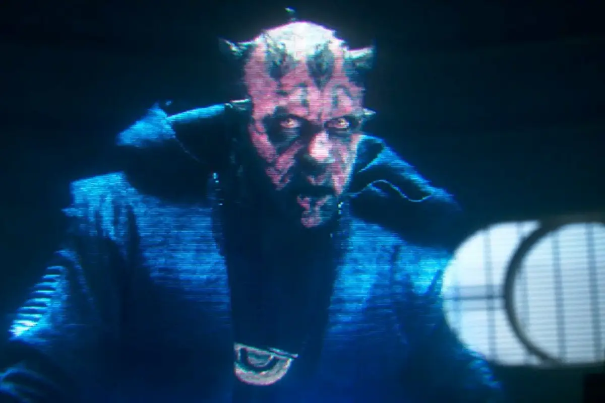 Maul appears via holocomm as leader of Crimson Dawn.