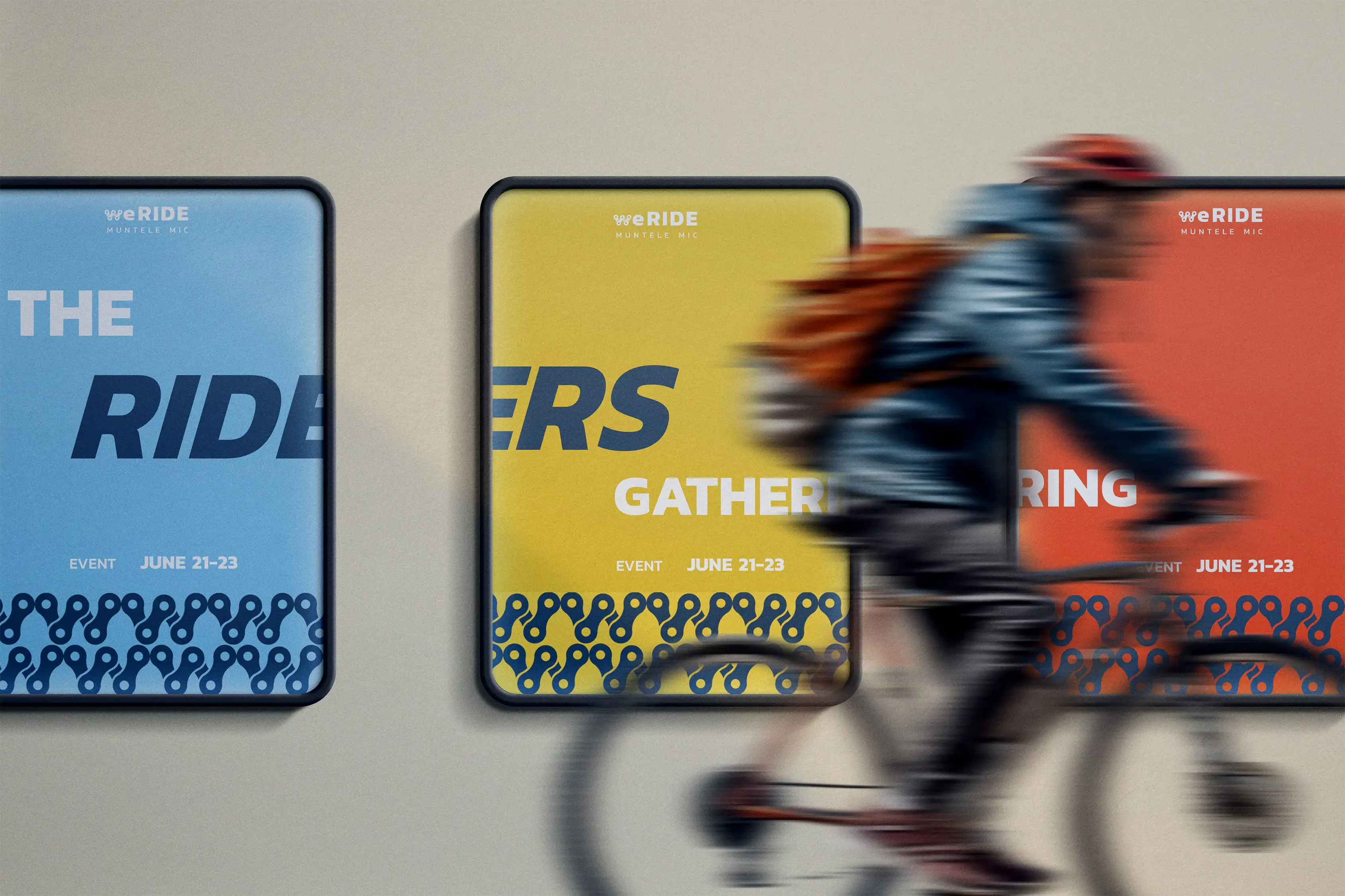 An image of a cyclist passing by posters advertising a WERIDE event