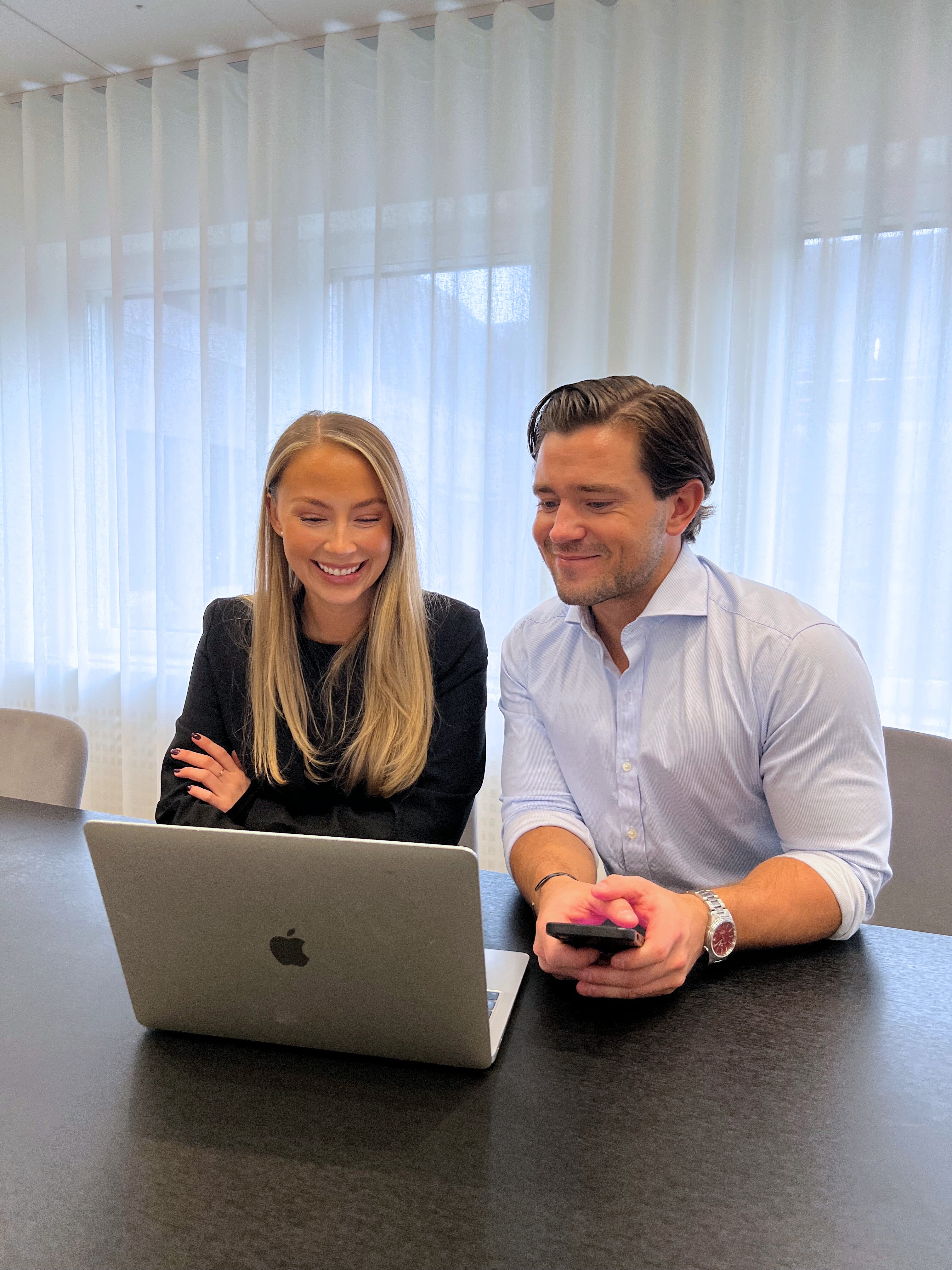 person holding compass selective focus photography