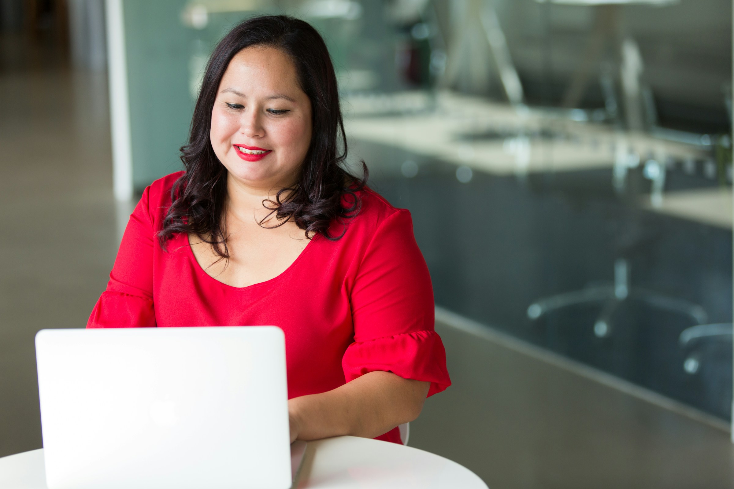 woman infront of laptop - How to Cite an Article 