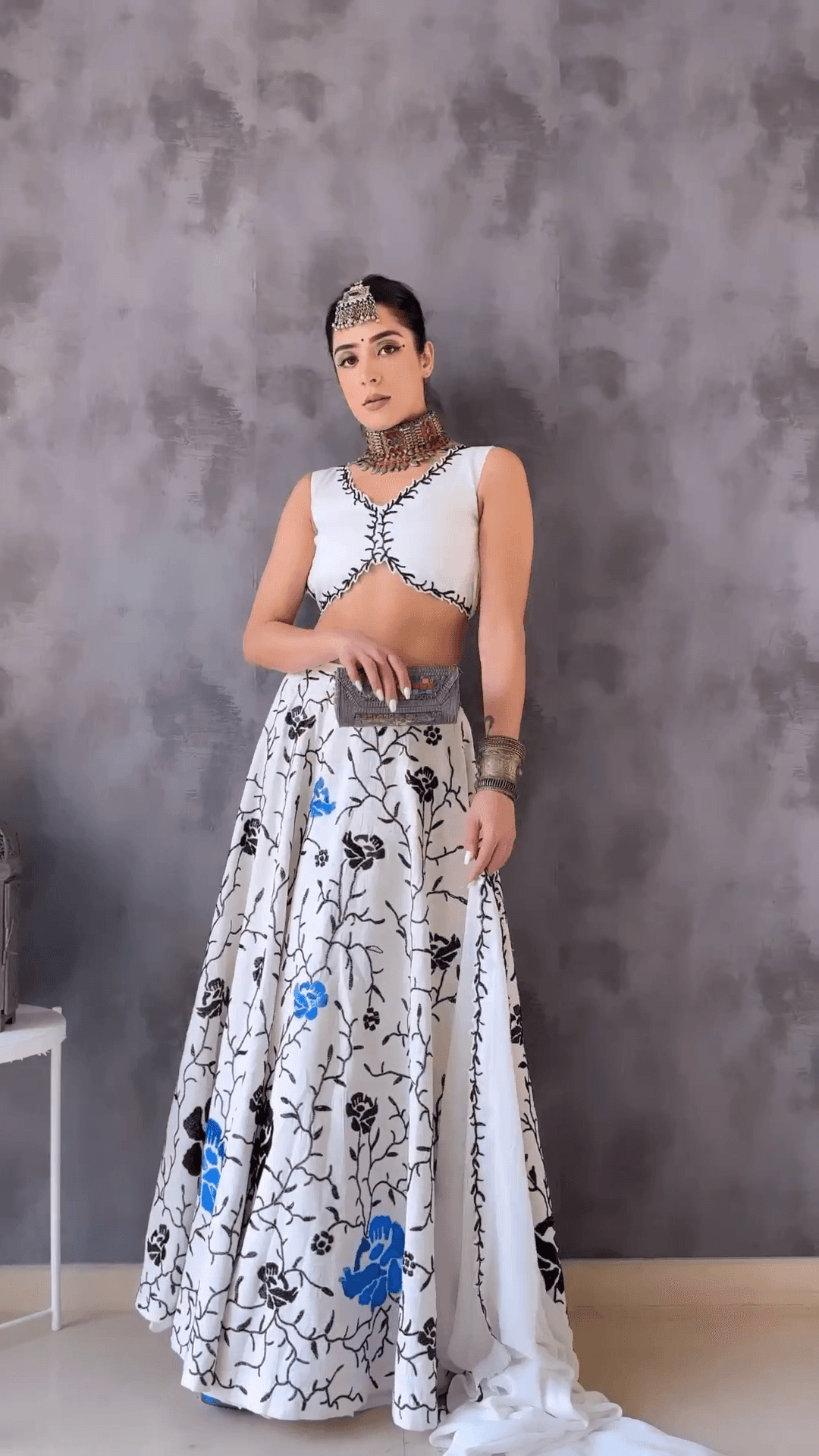 Young girl with backpack walks on dirt path