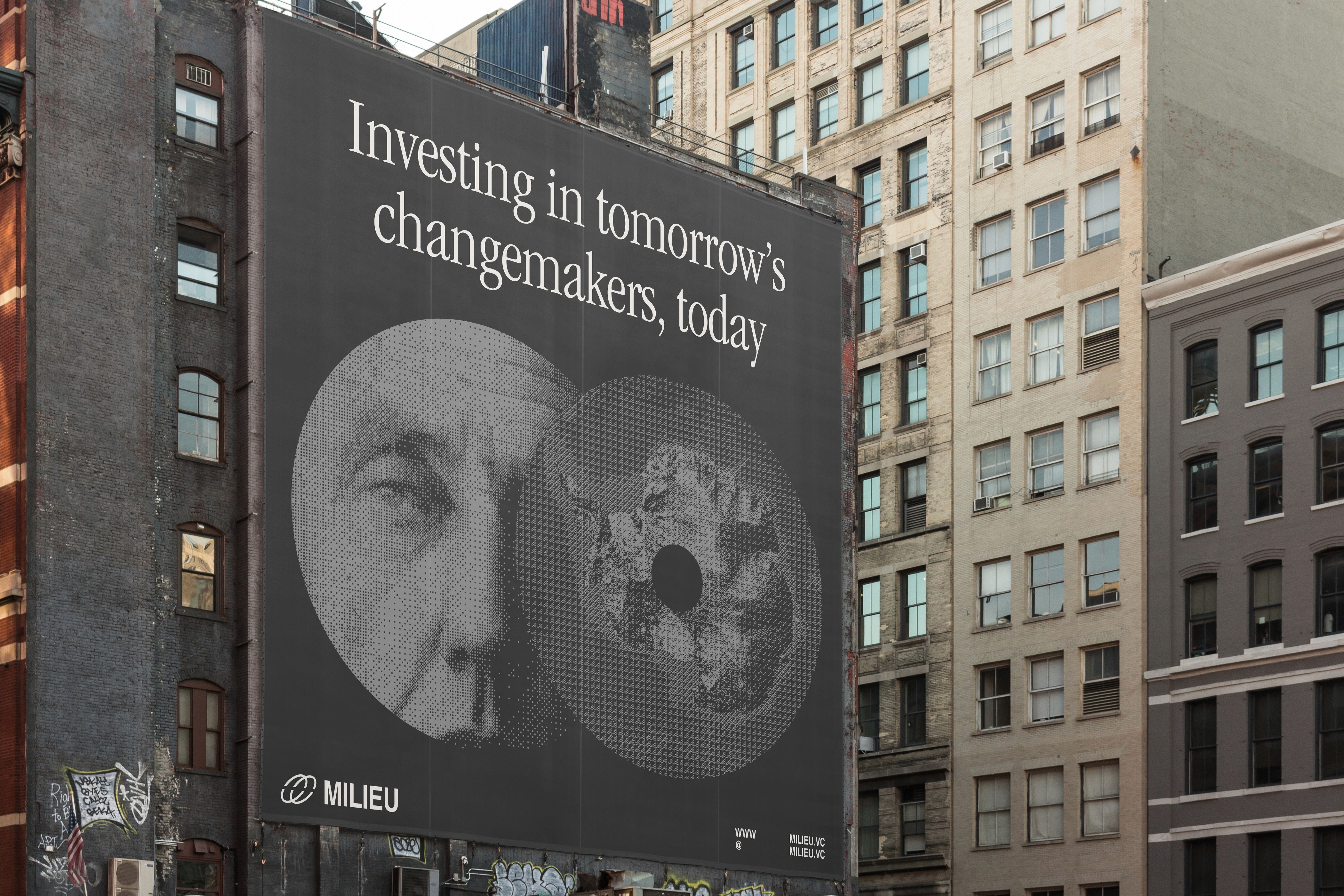Large building-side billboard reading “Investing in tomorrow’s changemakers, today” with two halftone circles and the Milieu logo