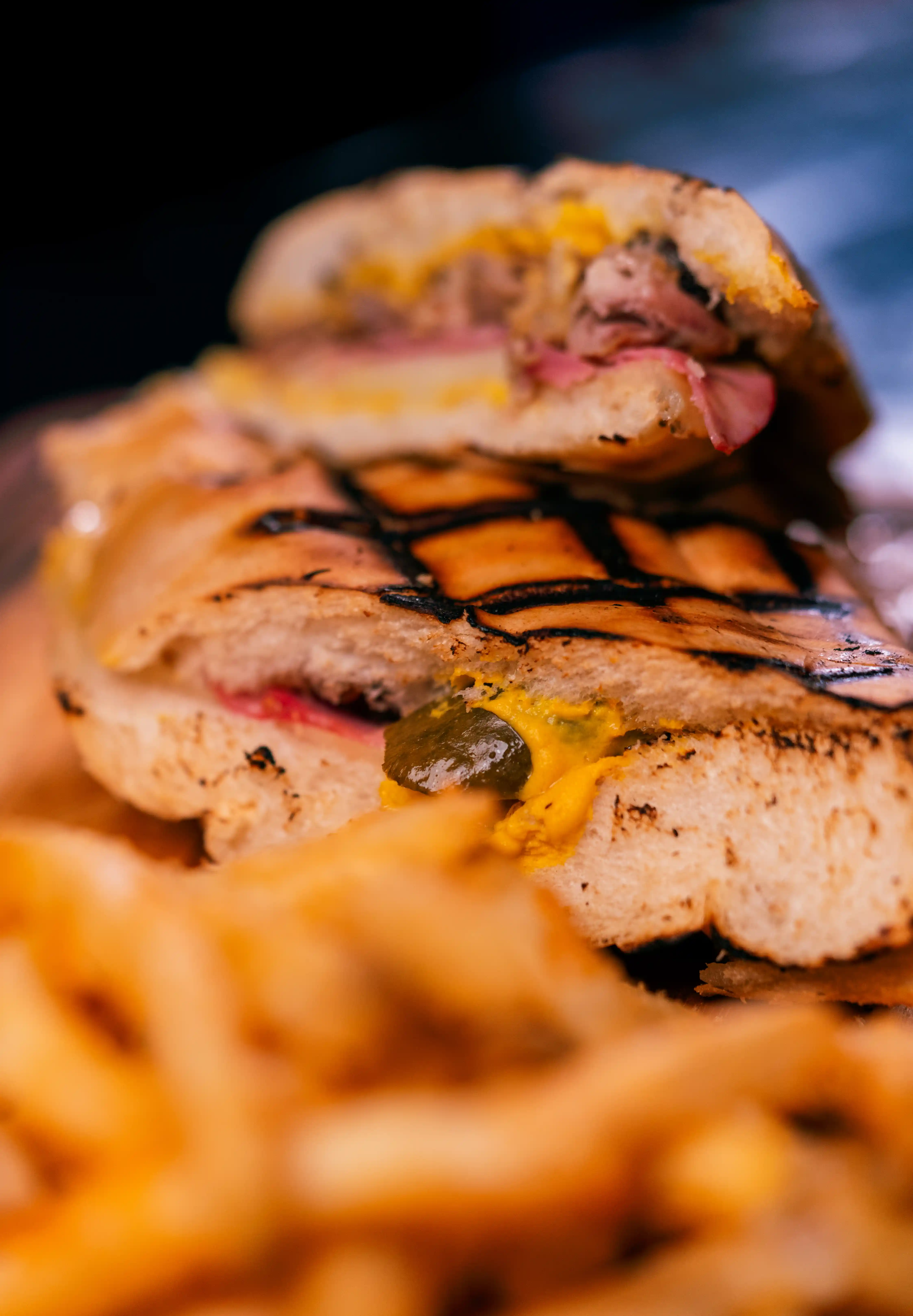 a chopstick holding a sashimi