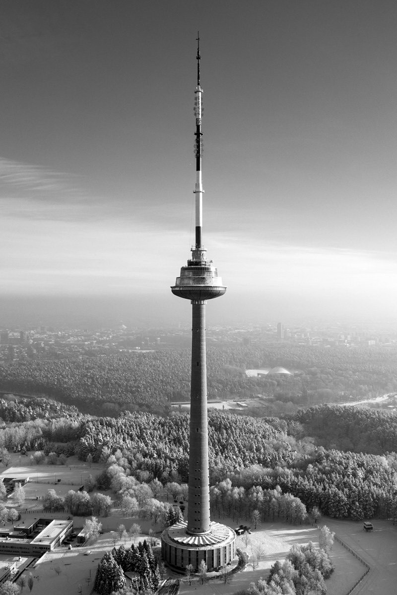 Vilnius TV Tower covered in snow sunny day - Lithuanian capital winter charm