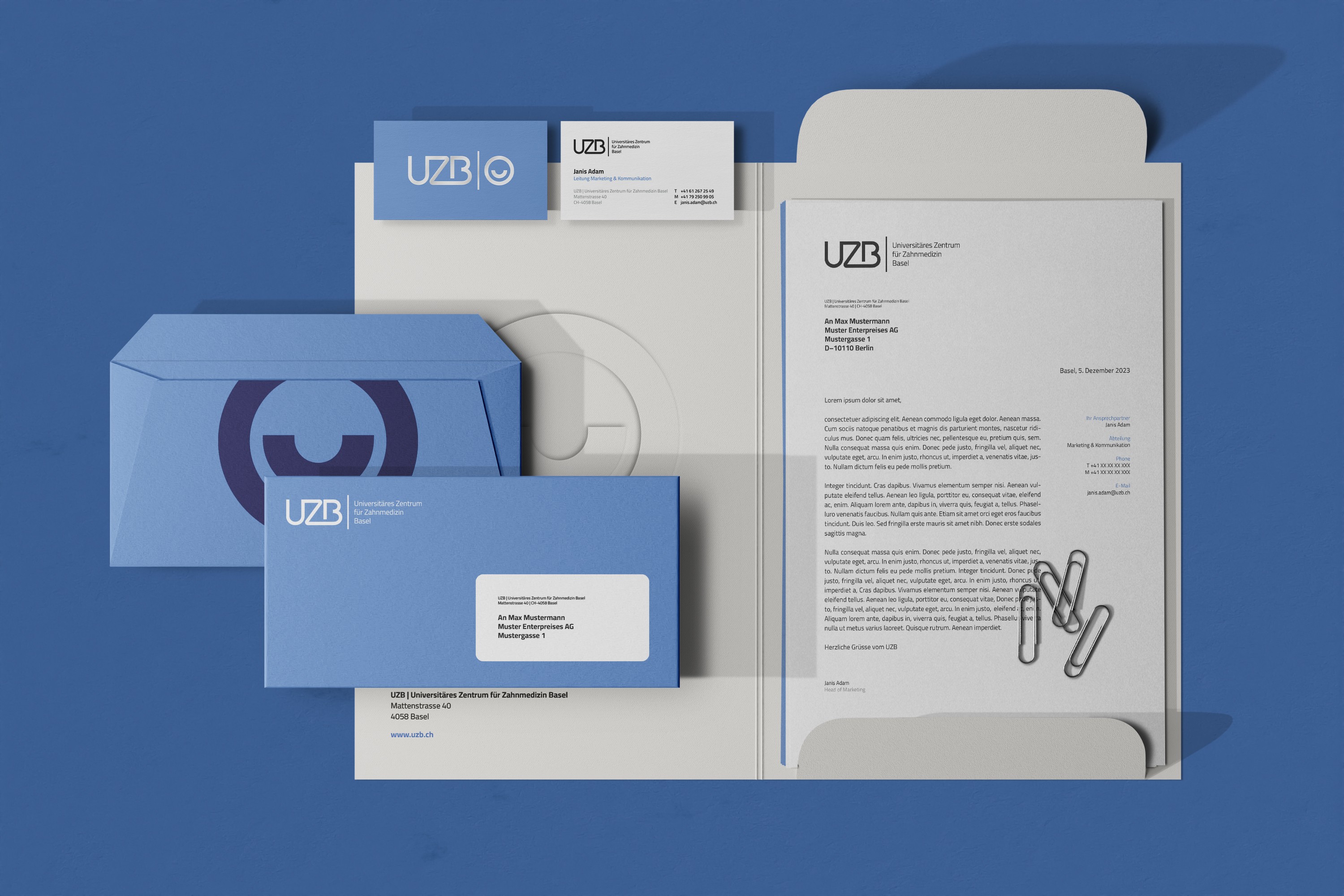 Geschäftsausstattung für die UZB Basel – Briefpapier, Visitenkarten und Formulare im neuen Corporate Design.