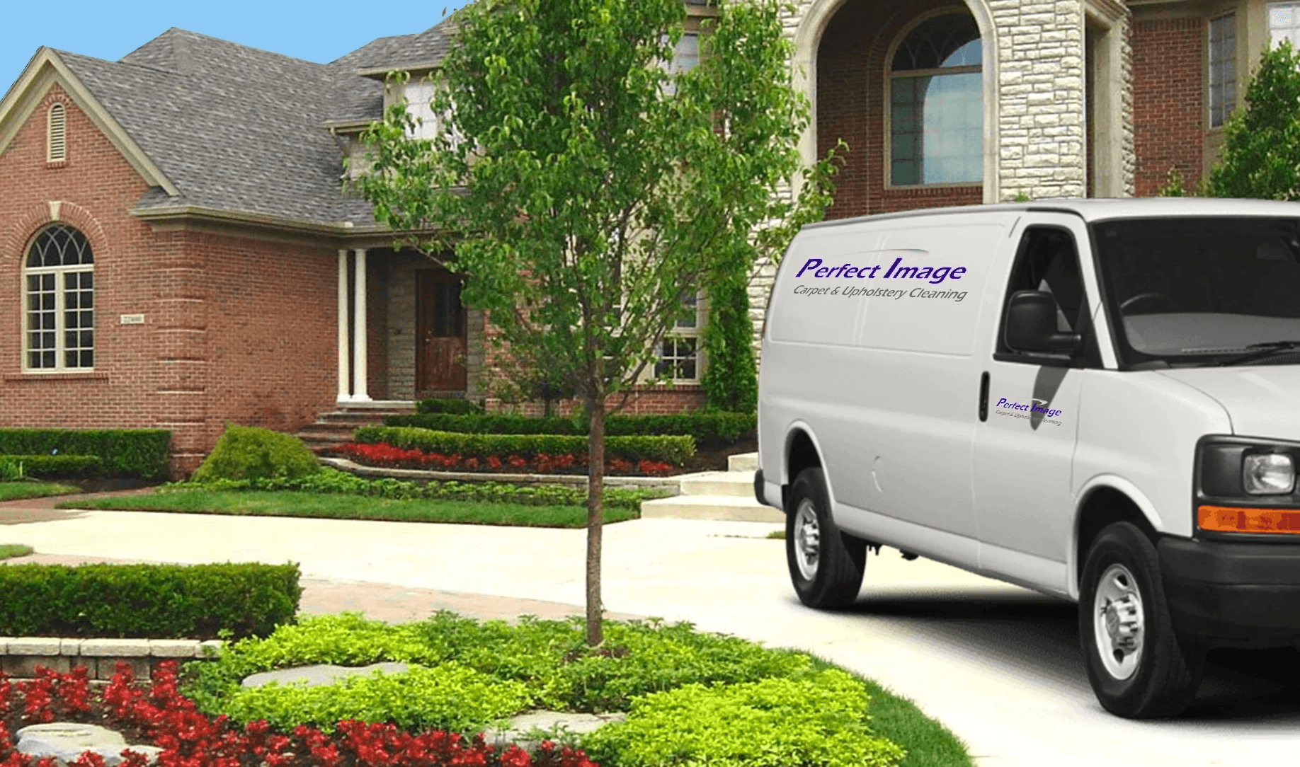 perfect image carpet and upholstery cleaning van in front of house