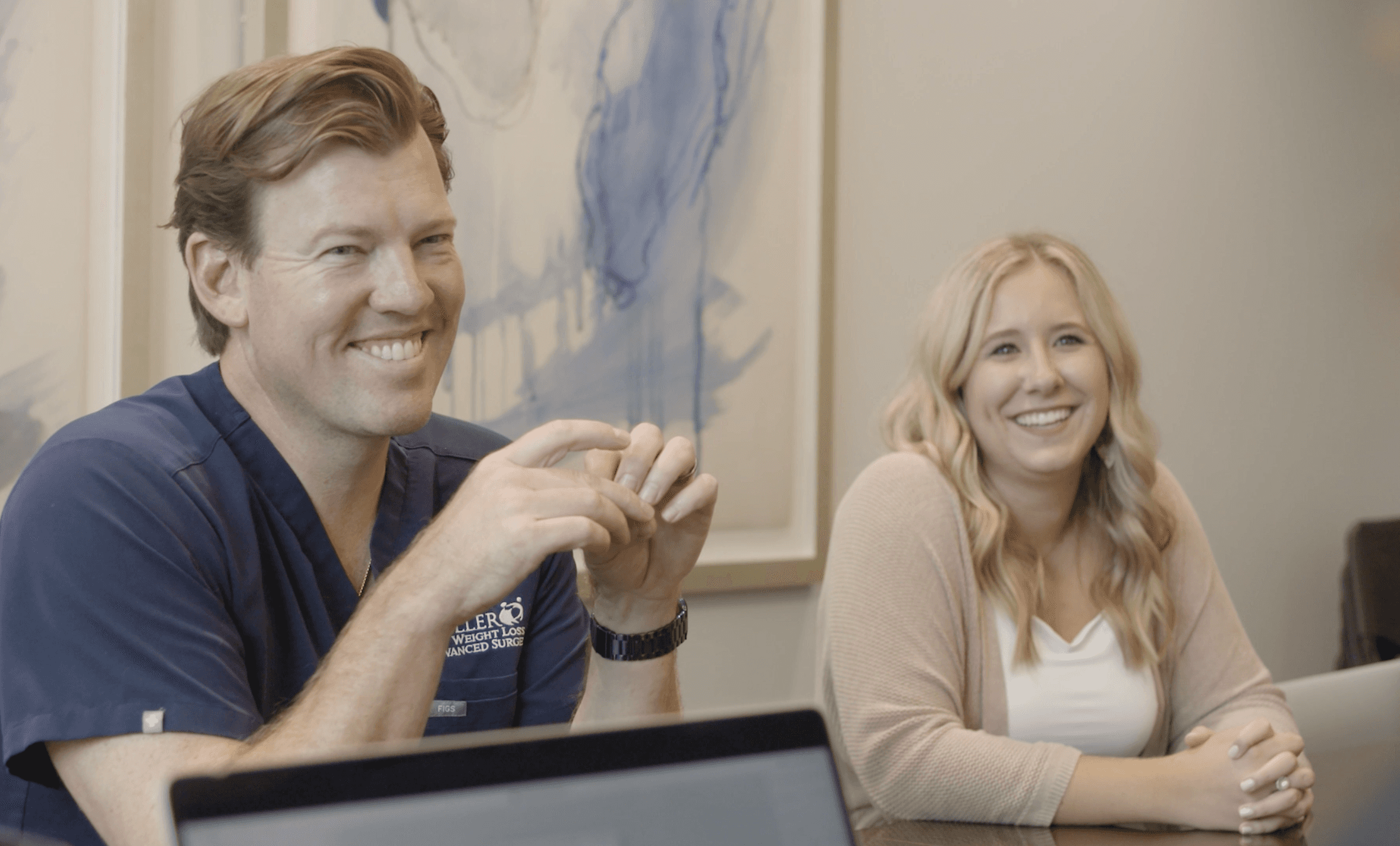 Client partners from Roller Weightloss, smiling in a board room