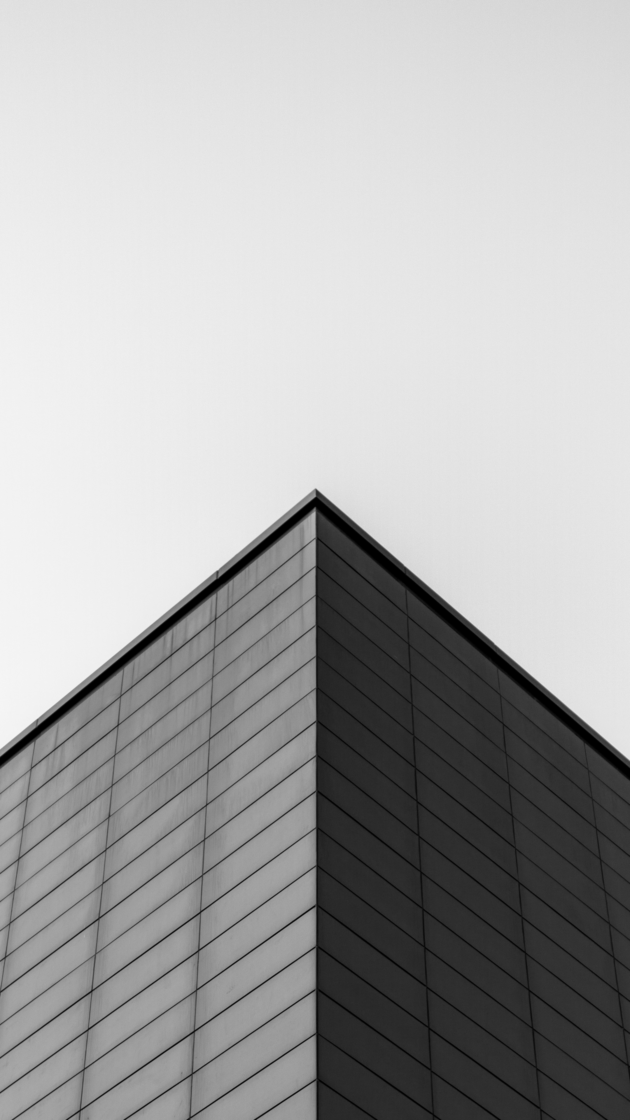 a black and white photo of a tall building