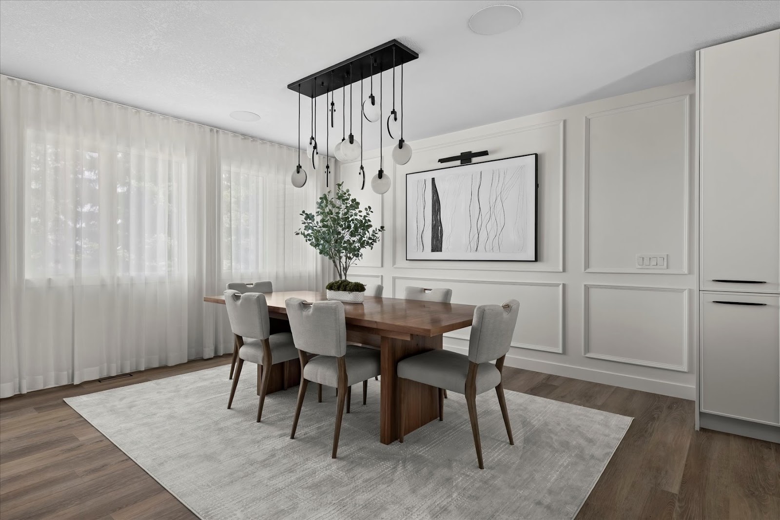 Strathcona Residence dining room after renovation by HAUS Interiors