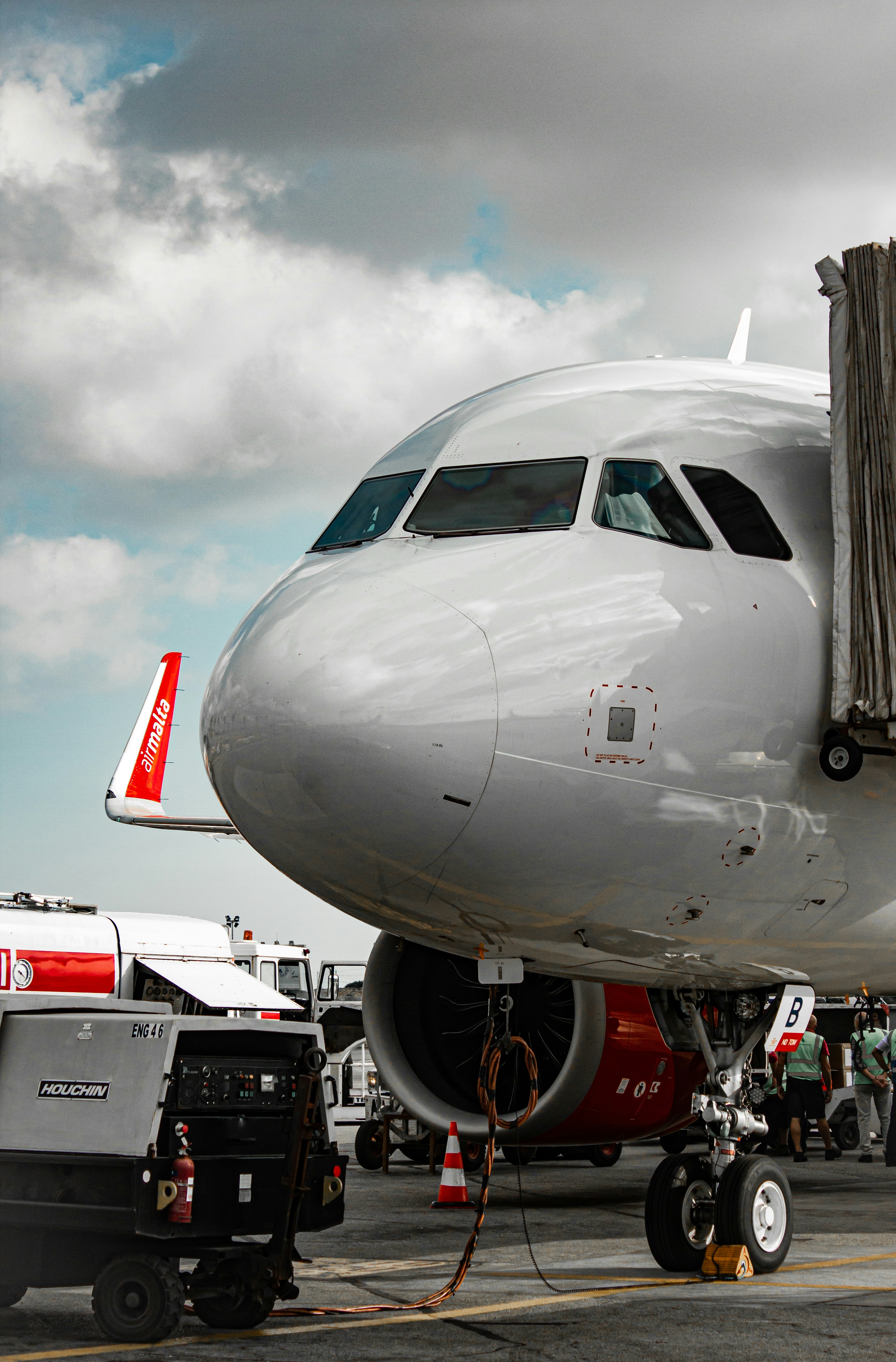 a large jetliner sitting on top of an airport tarmac