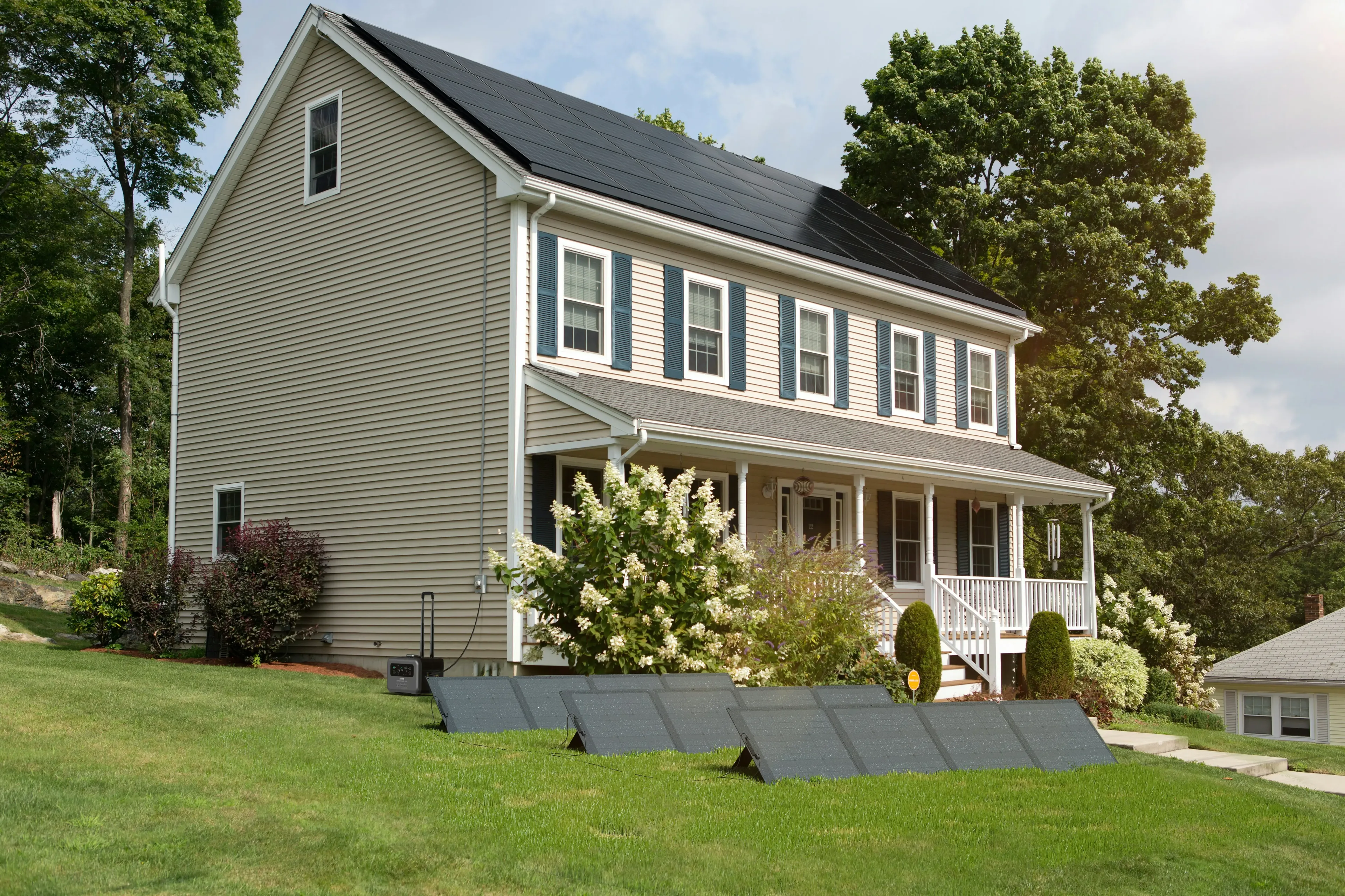Modern two-story home equipped with rooftop solar panels
