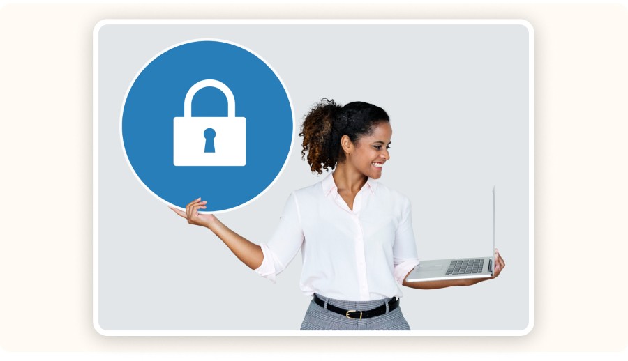 Woman holding a laptop with a lock symbol