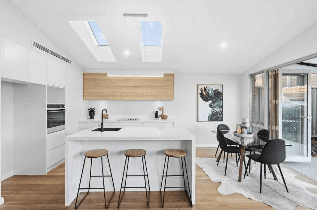 Elegant open-plan kitchen and dining area in a newly renovated Inner West home.