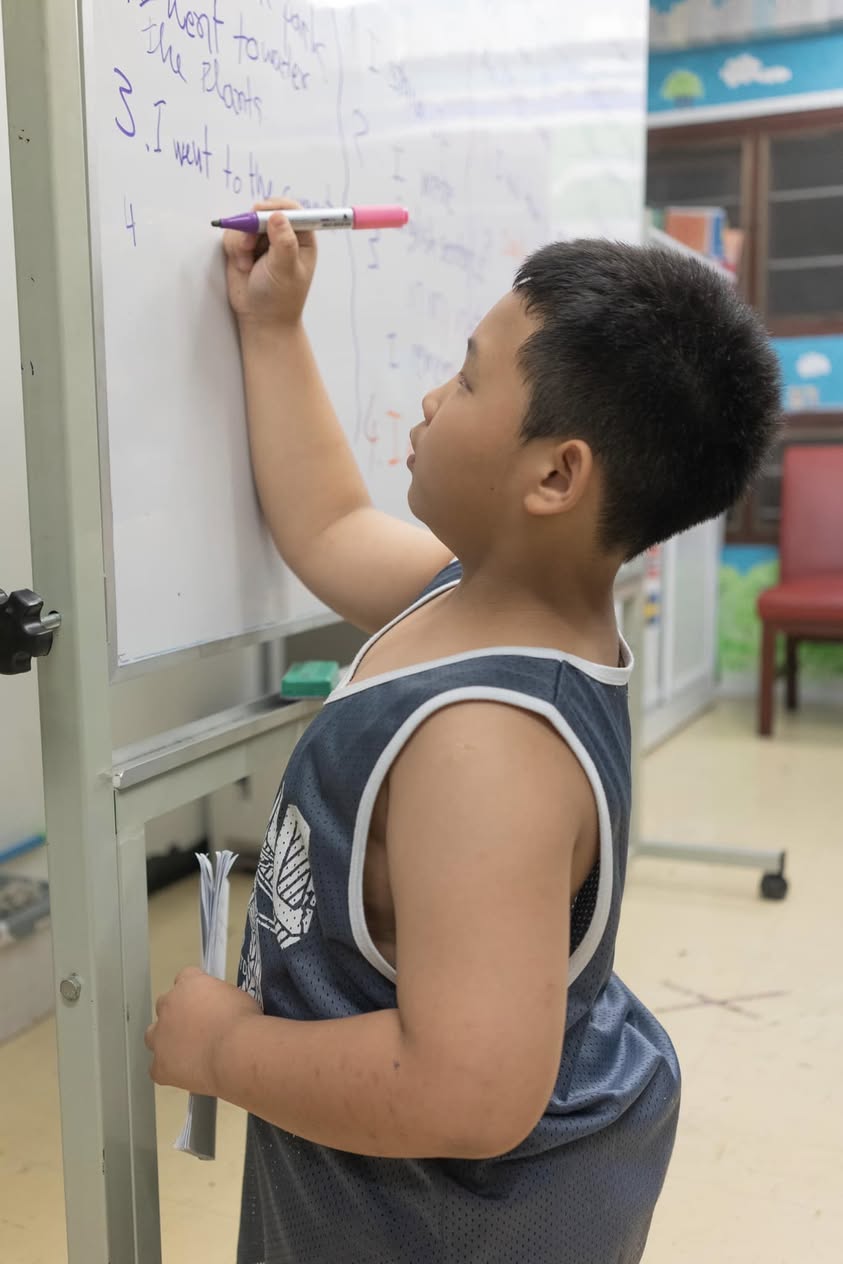 three toddler's in red clothes