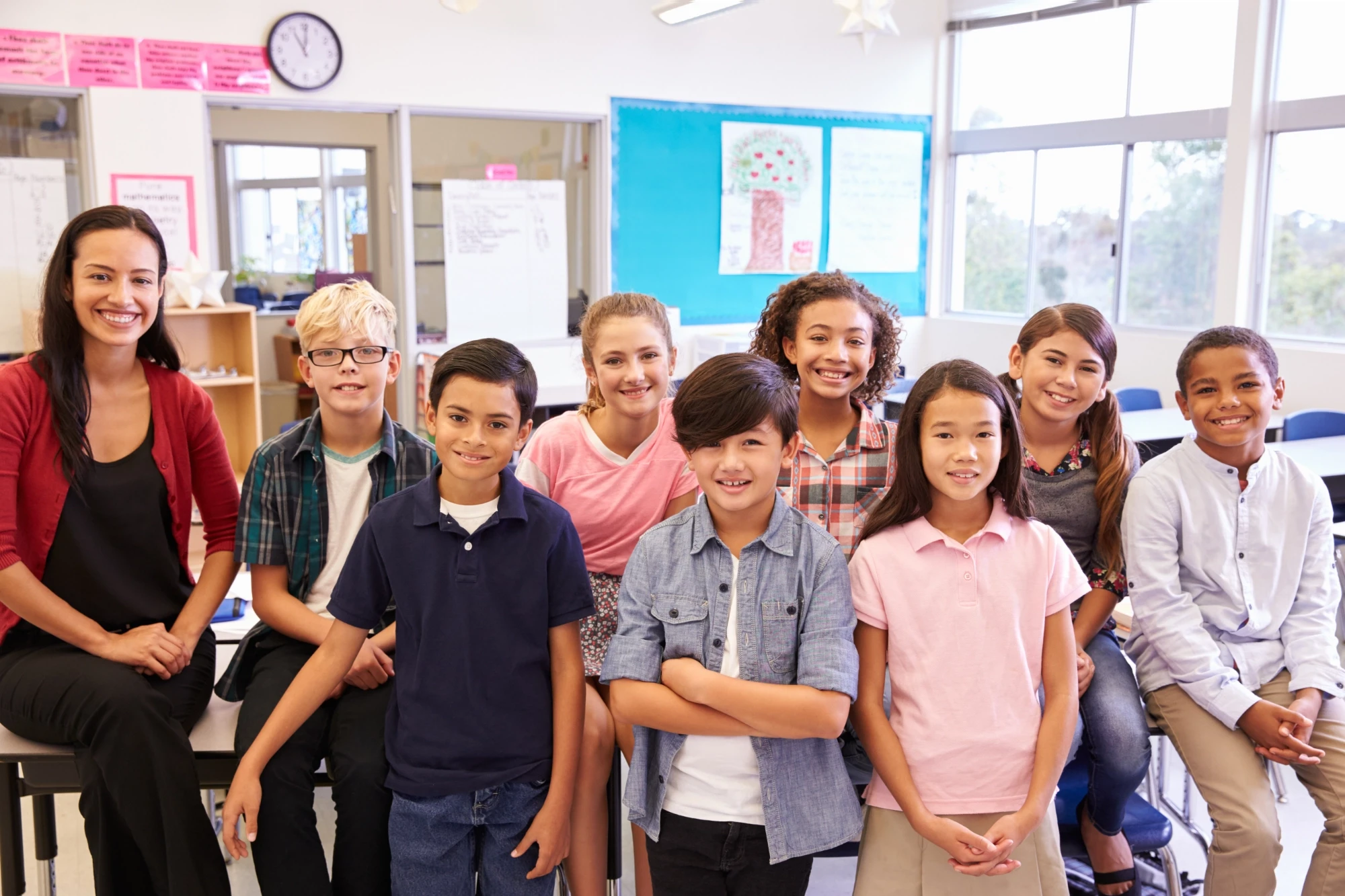 a teacher and her kids in classroom