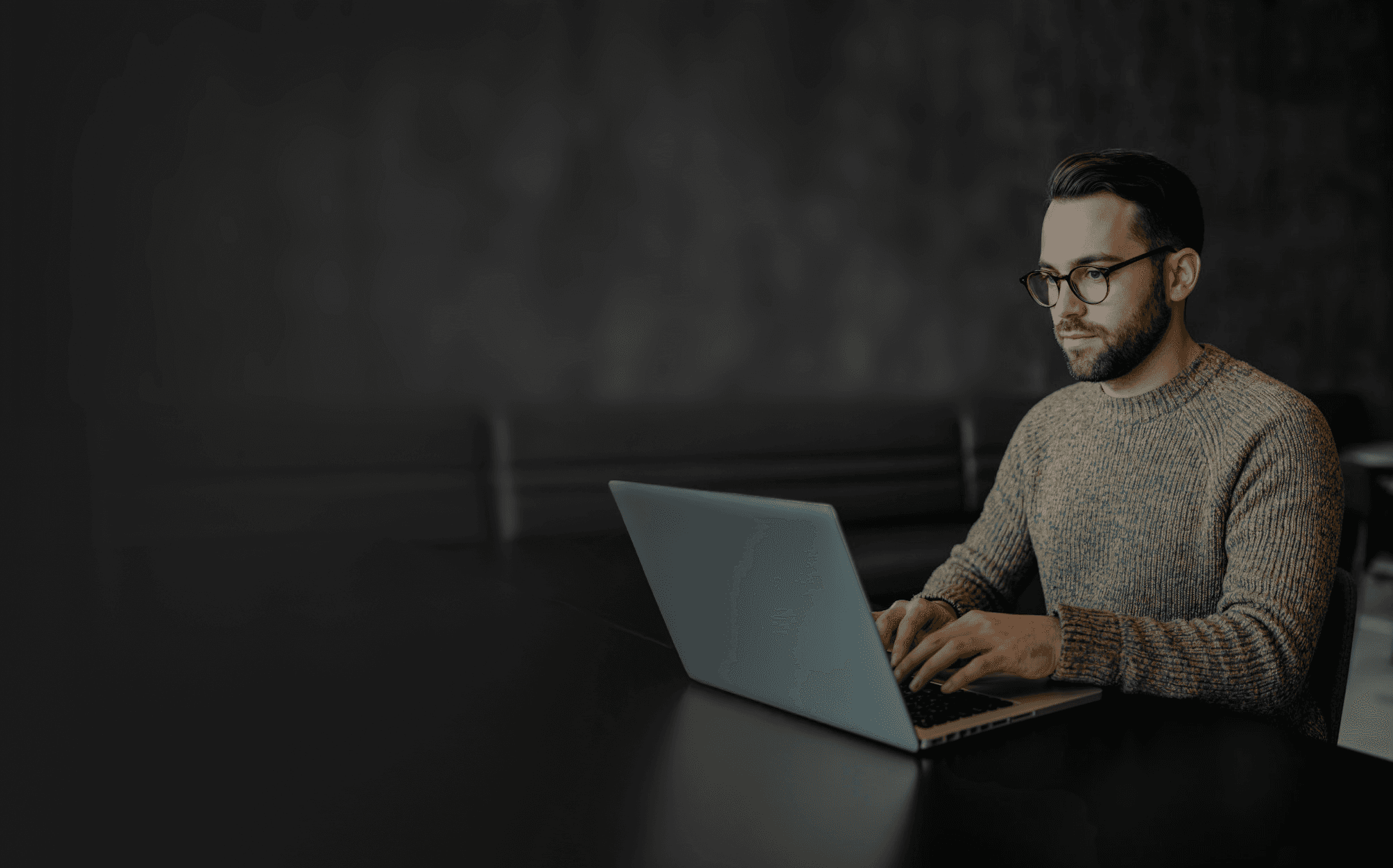 A man working at the desk