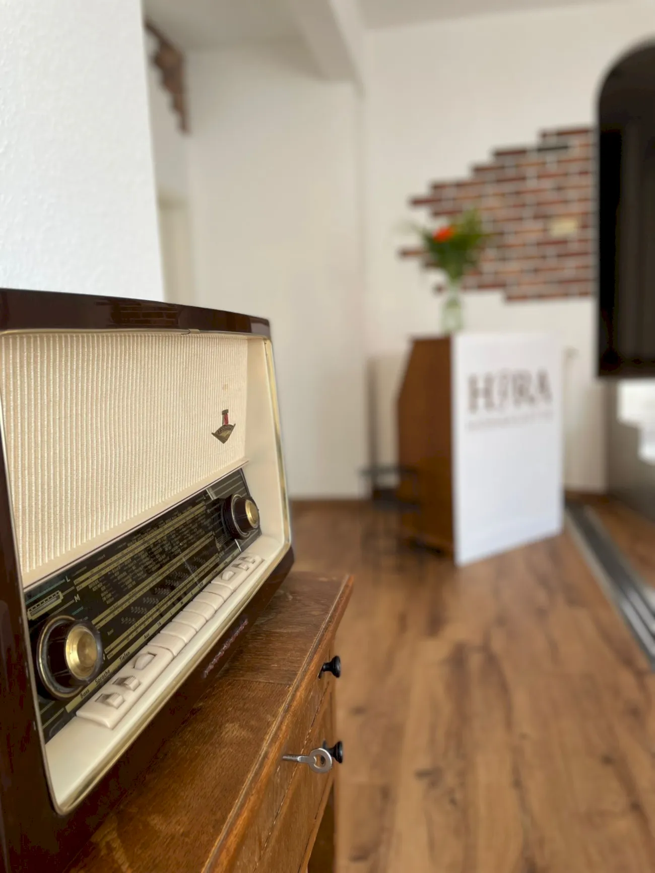 black flat screen tv on brown wooden table