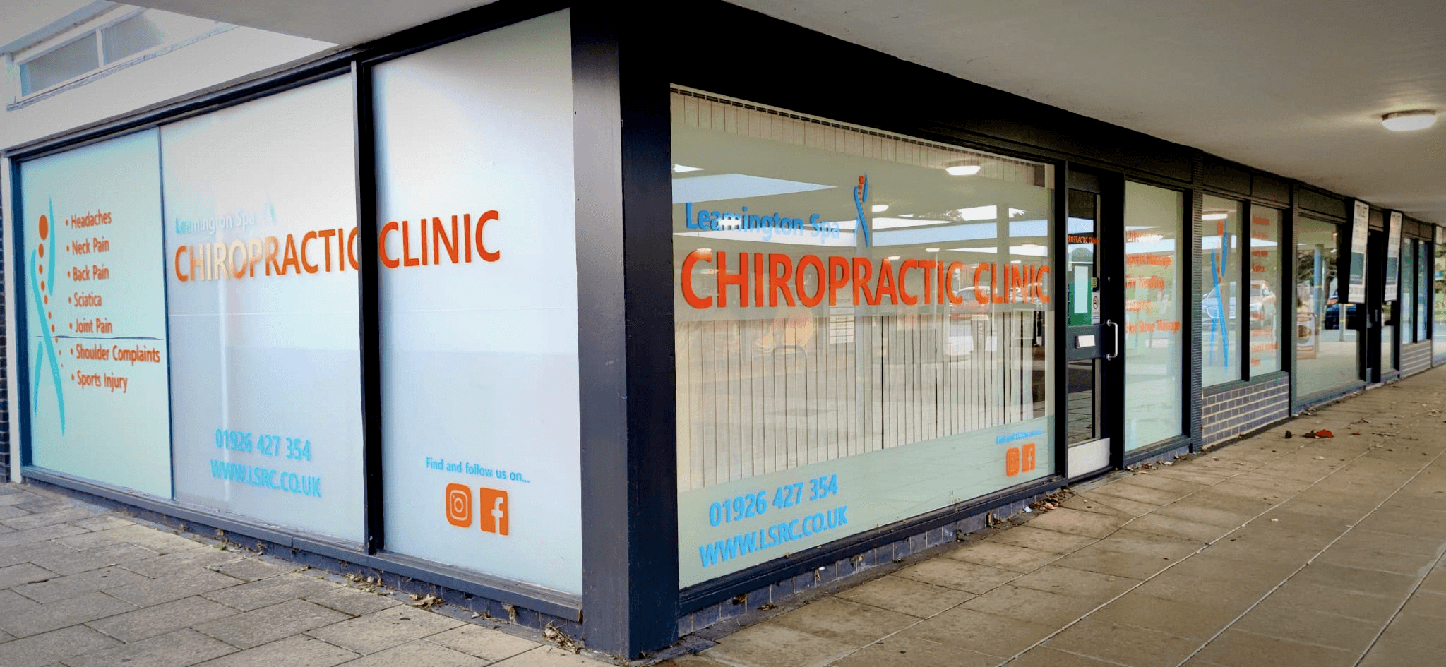 Leamington Spa Chiropractic Clinic storefront.  The window displays services offered including chiropractic, massage, sports therapy and dry needling.  Phone number and website are visible.