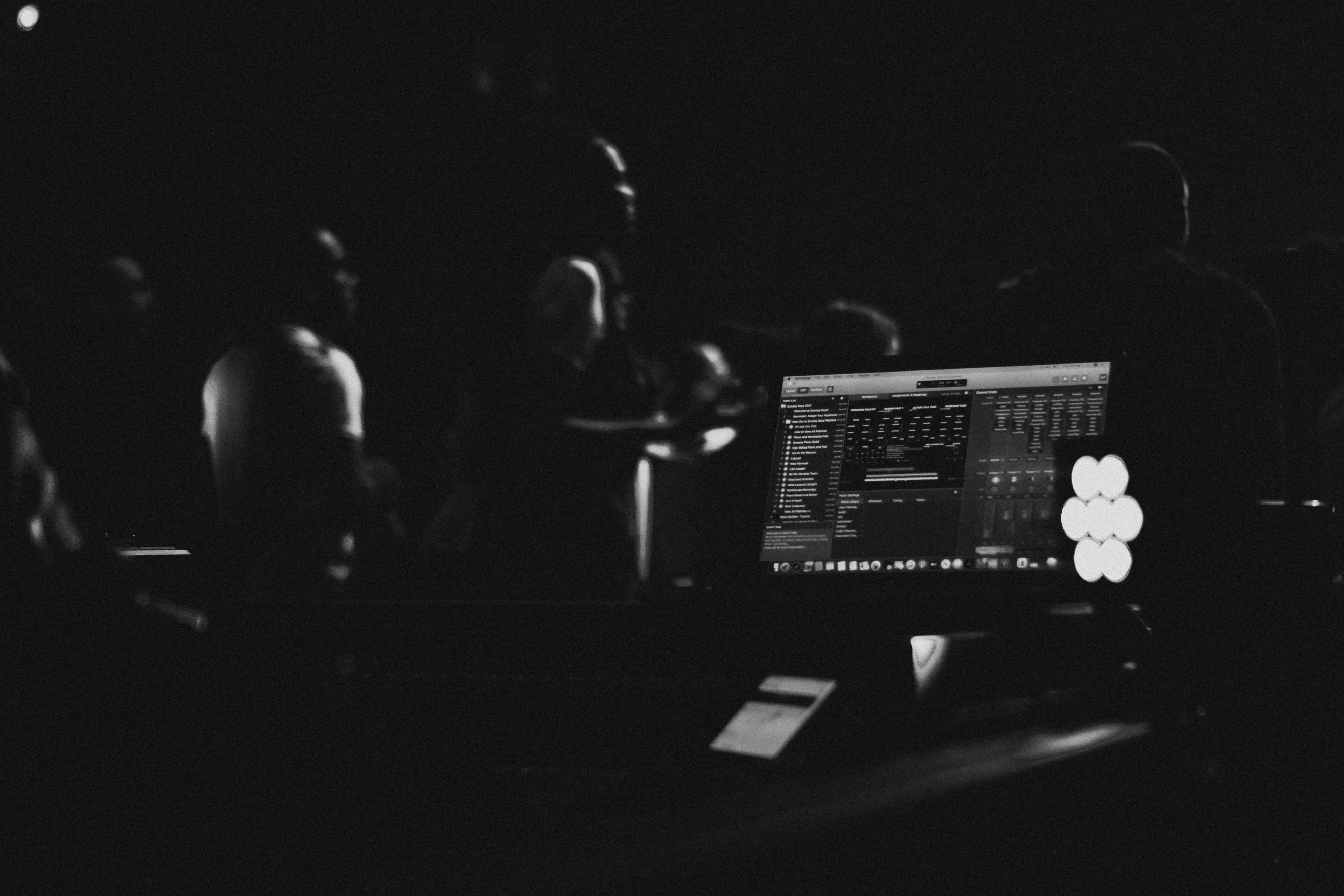 a laptop computer sitting on top of a table