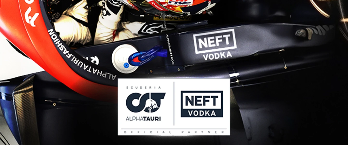 NEFT Vodka and AlphaTauri logos on a sponsored F1 car.