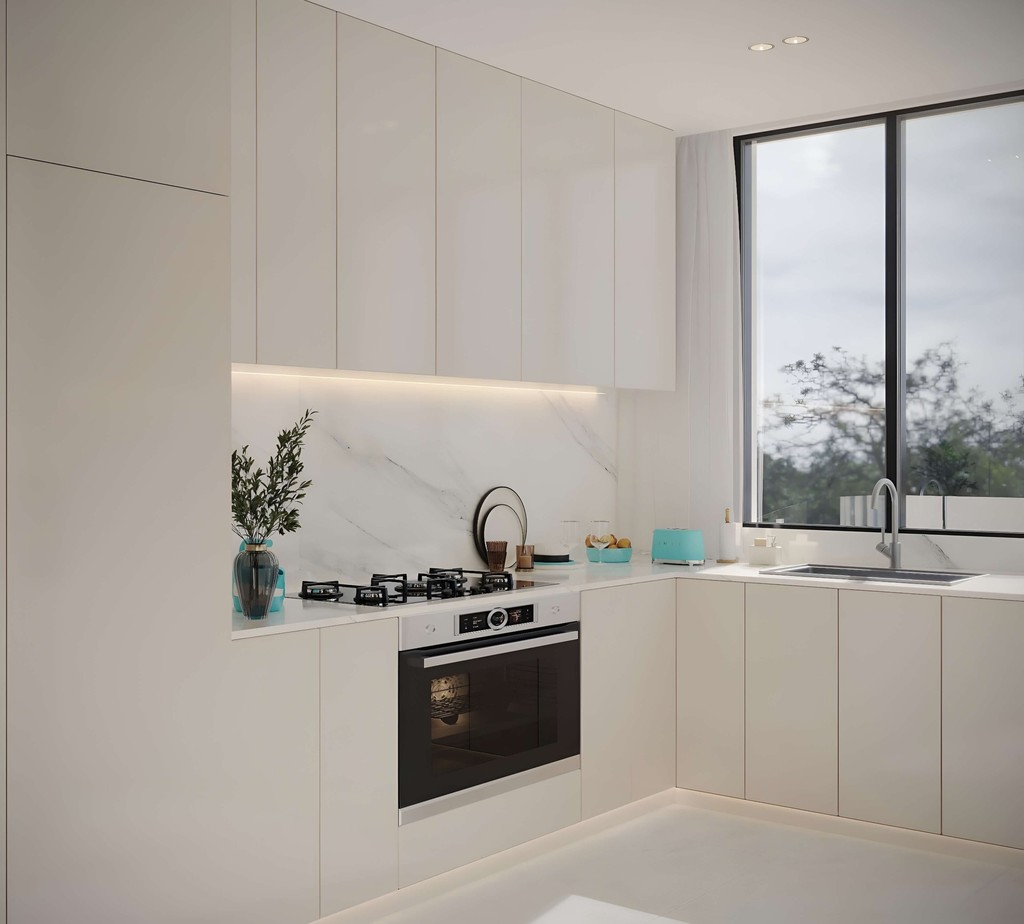 Modern kitchen design in Reef 996 Dubai featuring sleek cabinetry and high-end appliances.