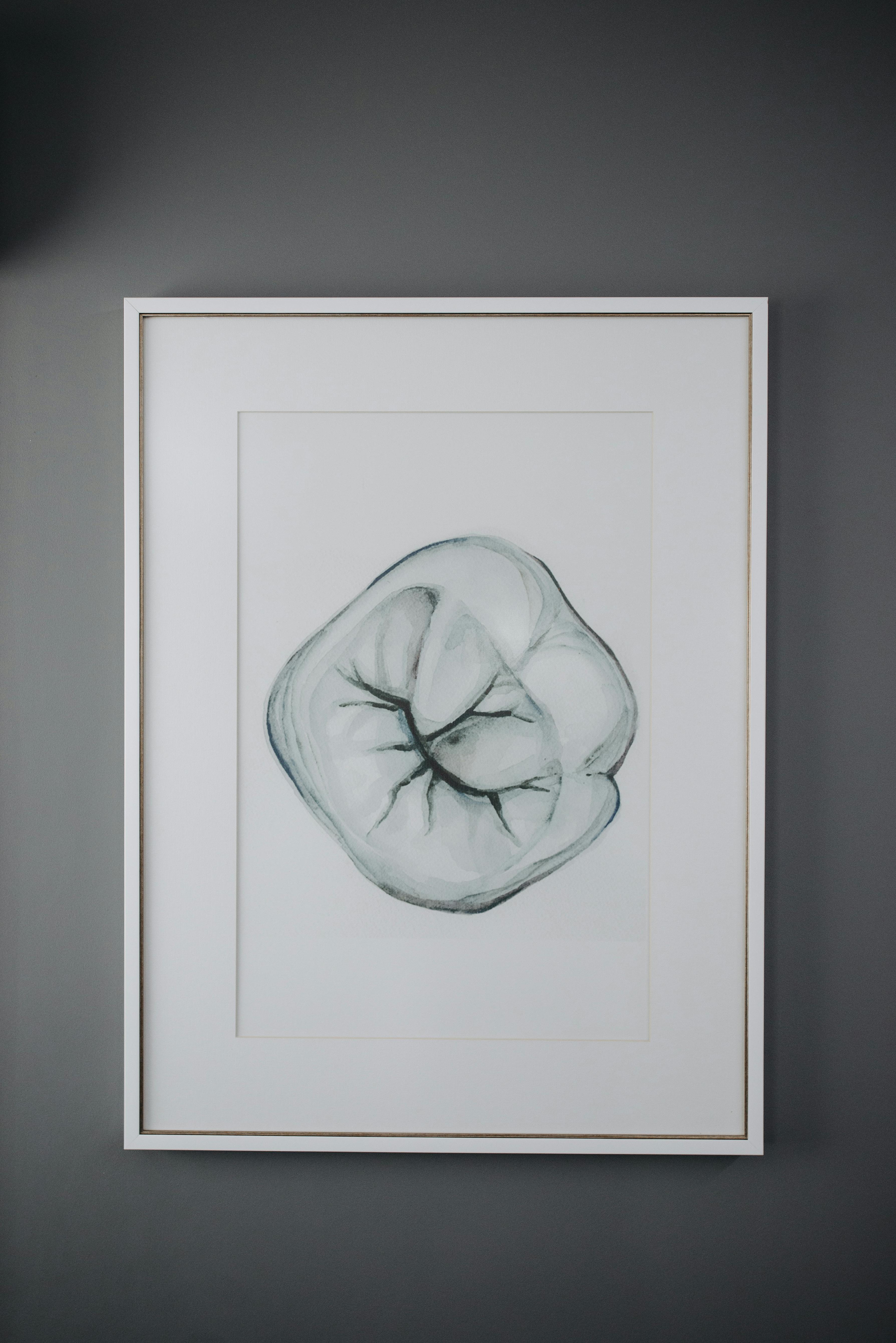 a woman standing in the dark with her arms outstretched