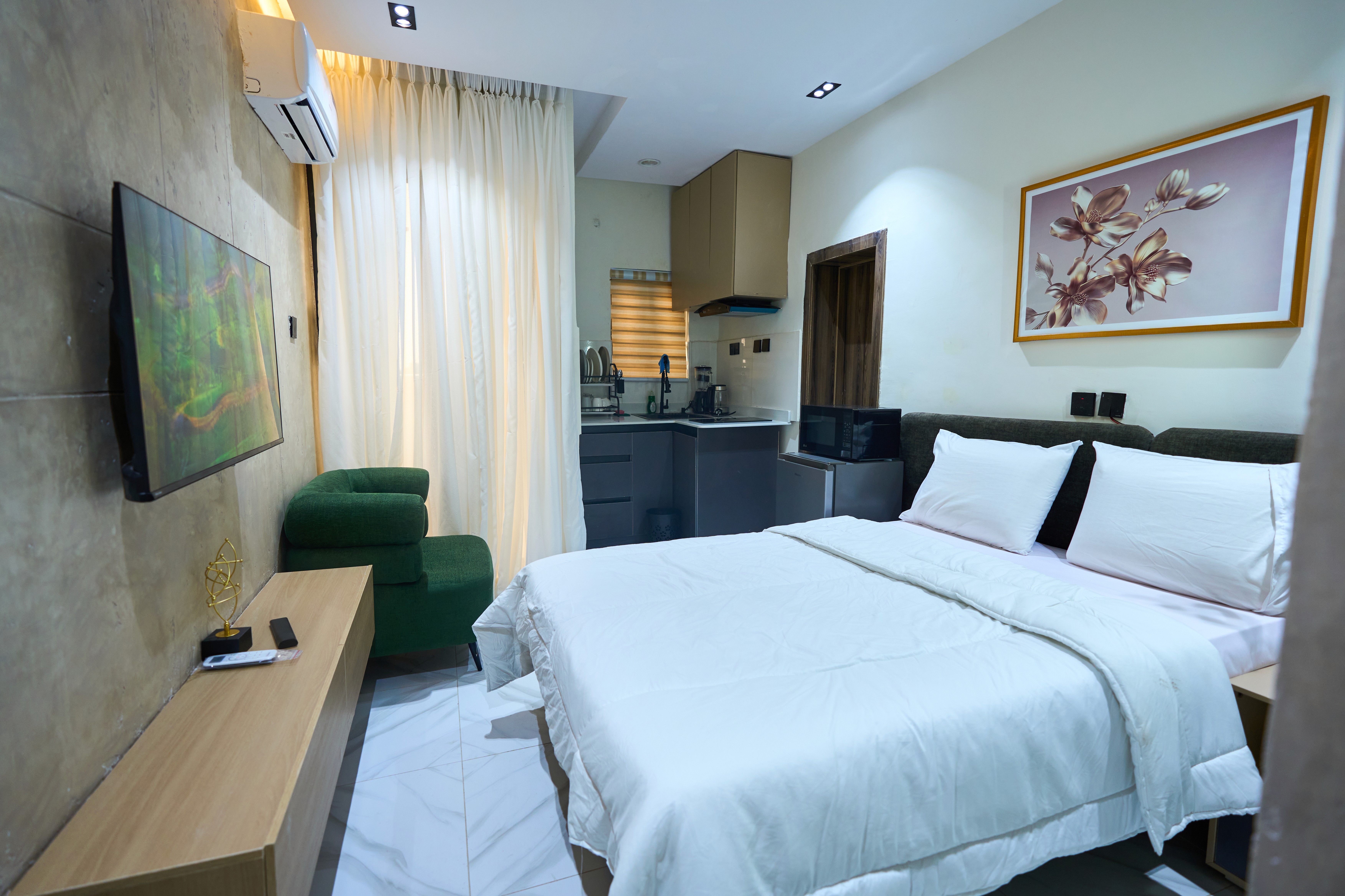 Comfortable bedroom in a Lodge & Loft serviced apartment in Lagos