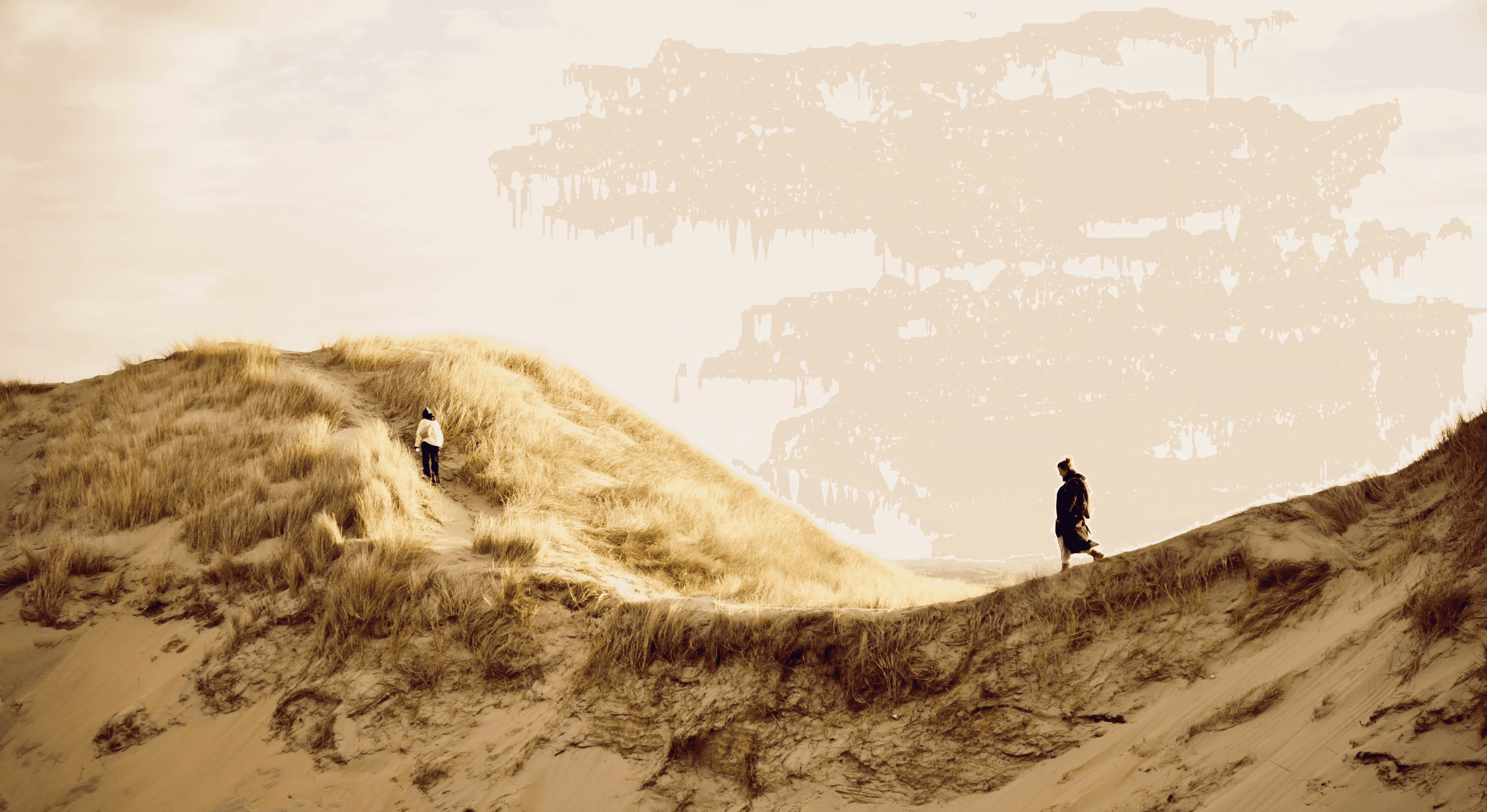 Two hikers passing trough dunes