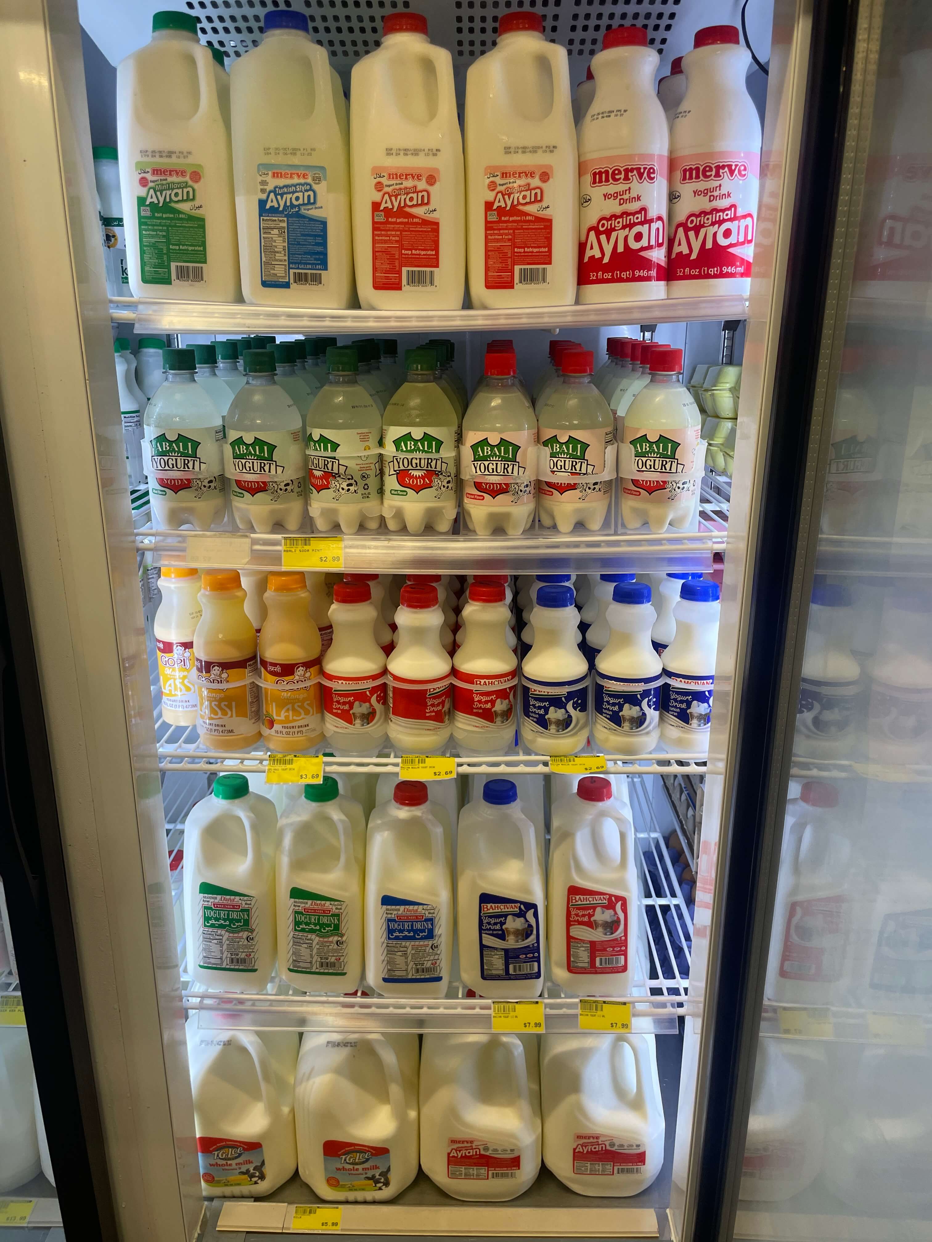 Milk and ayran drinks in the chilled section at International Food Market Orlando.