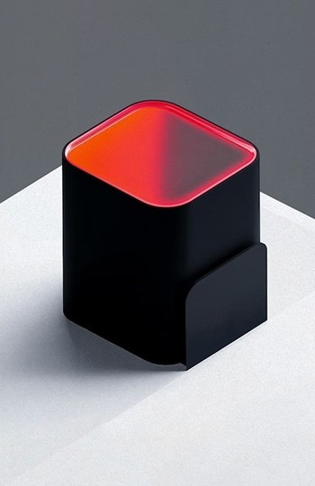 Red and black 3D cube mockup on a table