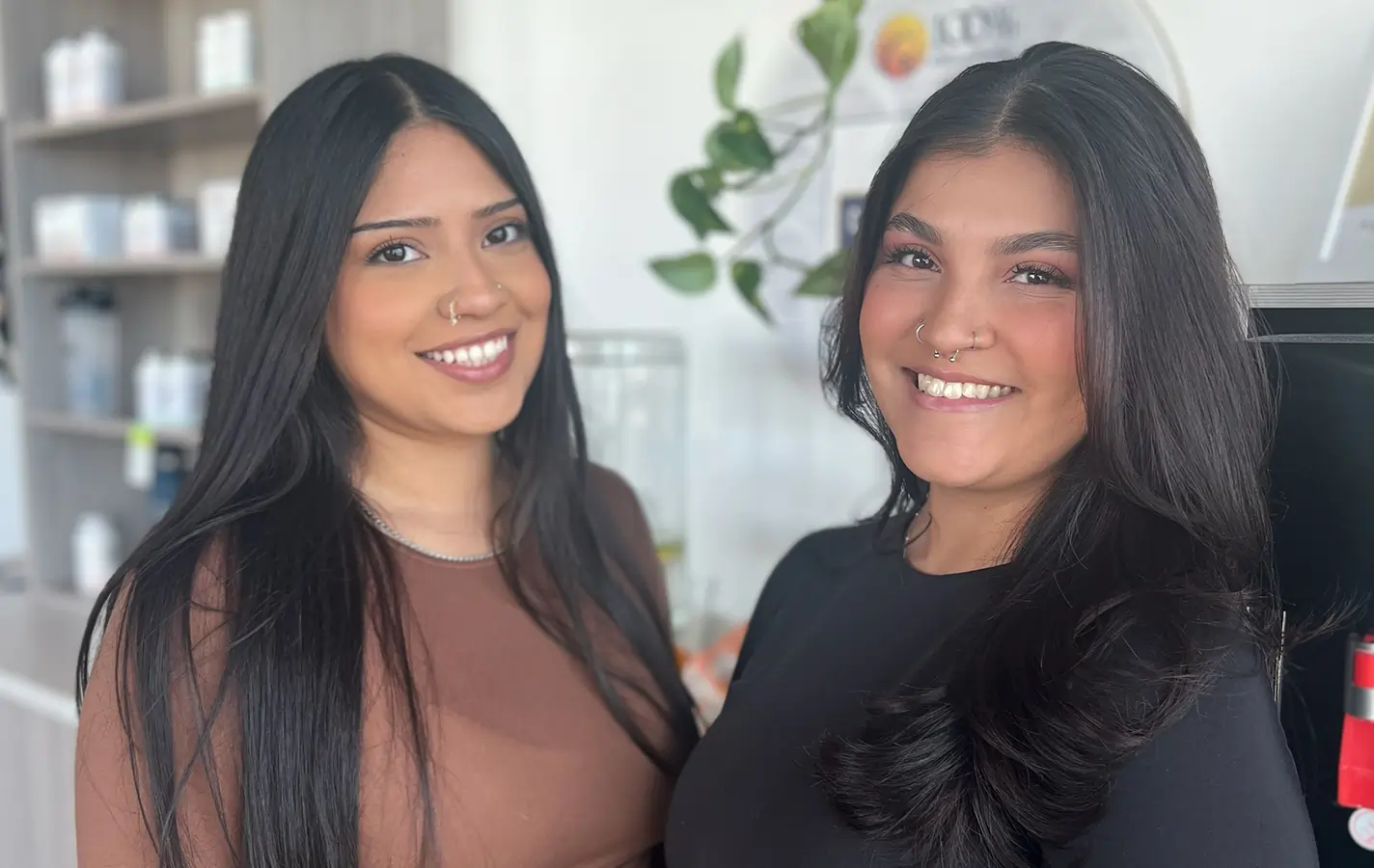 Photo of Vanessa and Justice, the front desk receptionists at 100% Chiropractic Central Park.