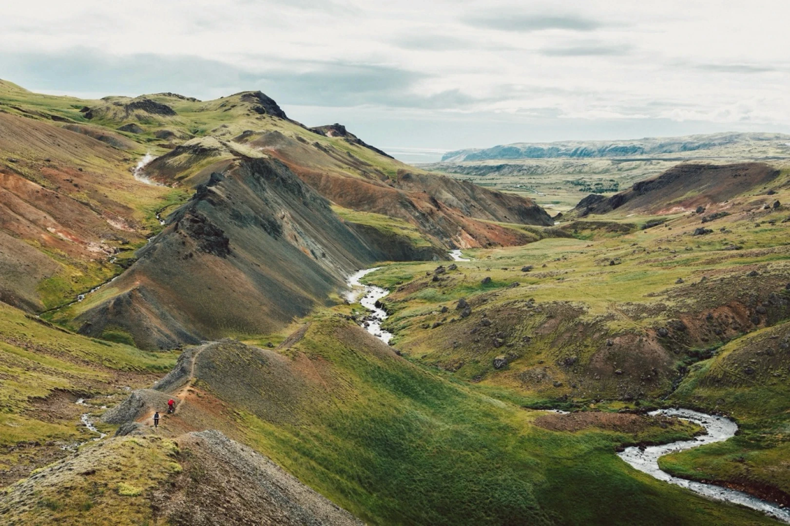 Wide shot of geothermal areas with singletrack