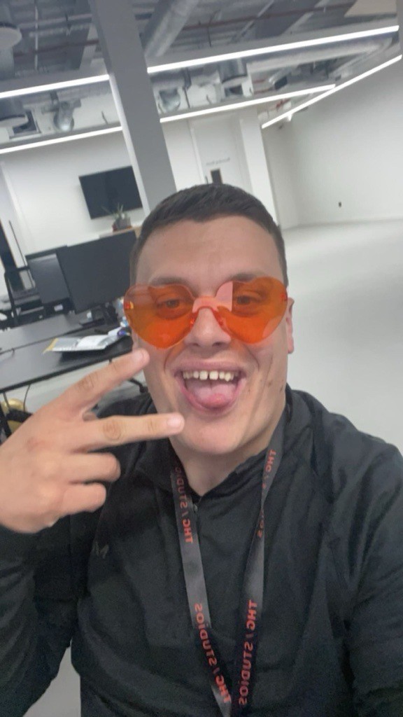 A young man riding a bicycle