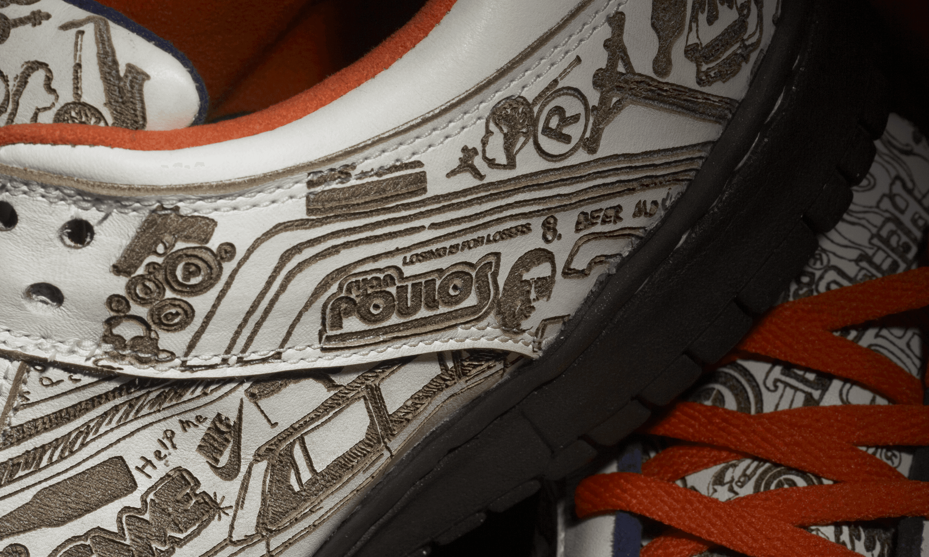 tight crop, detail of custom lasered nike dunk shoes