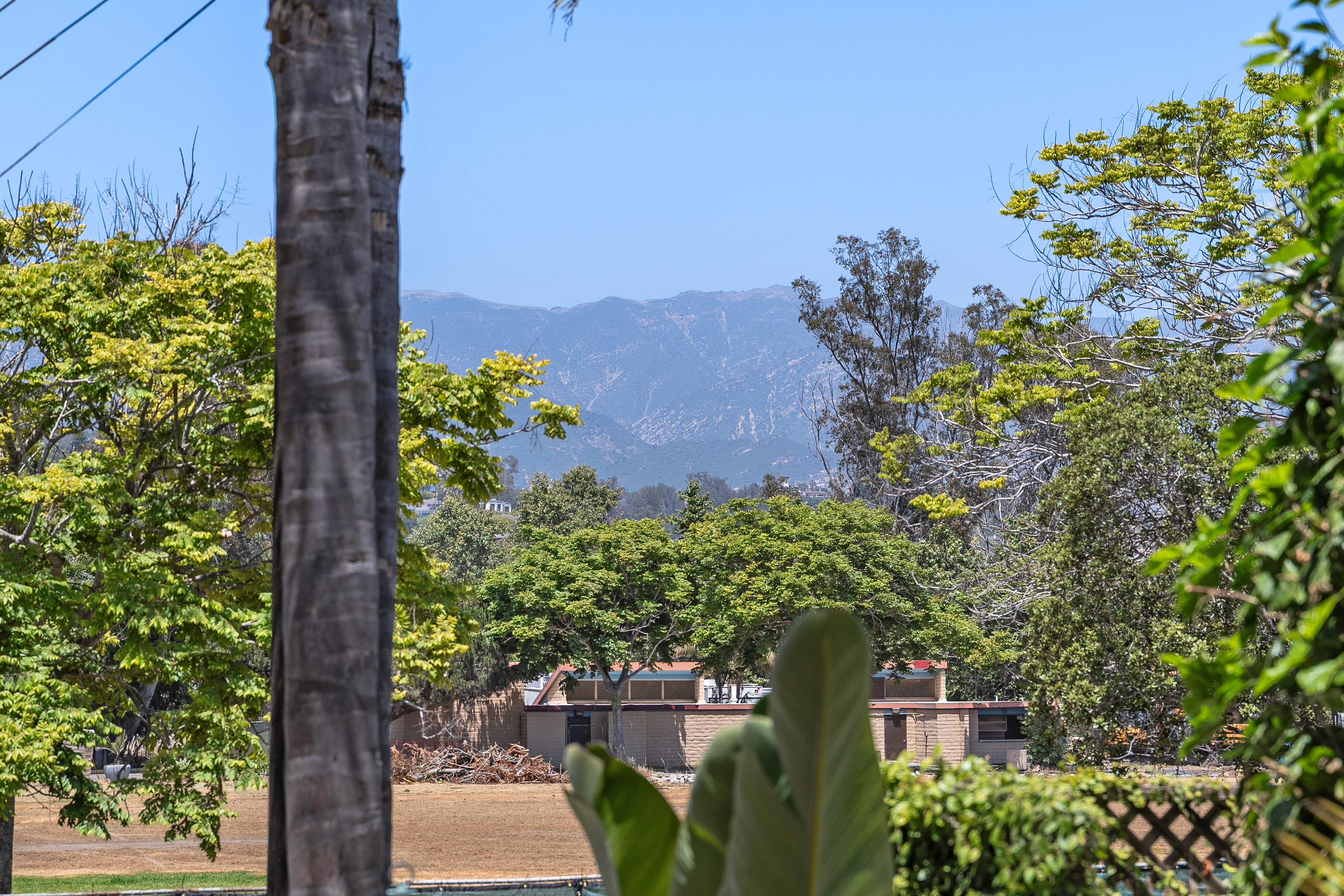 flat lay shot of spa amenities by the bathtub