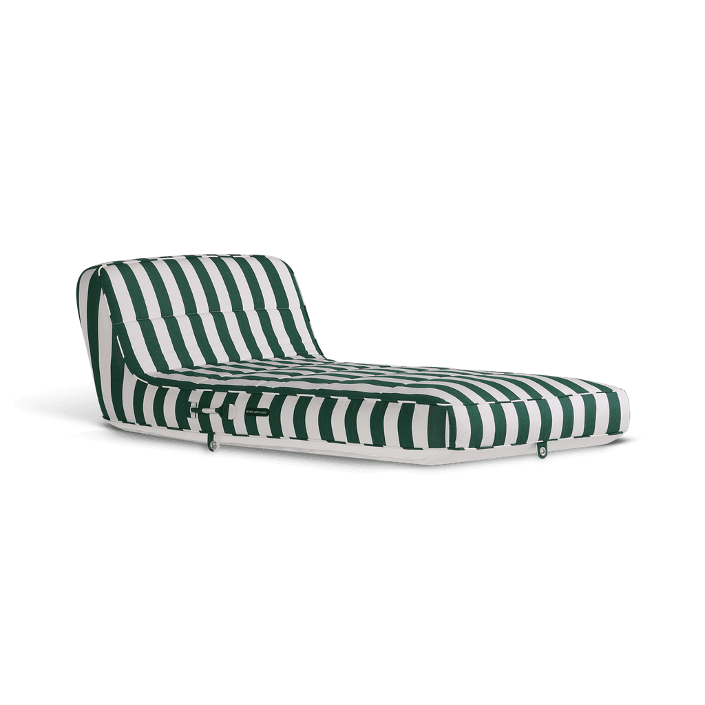 Luxury single pool float in bold green-and-white stripe canvas with raised headrest and quilted panels