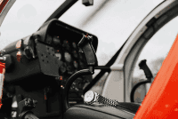 A woman reading a large open book