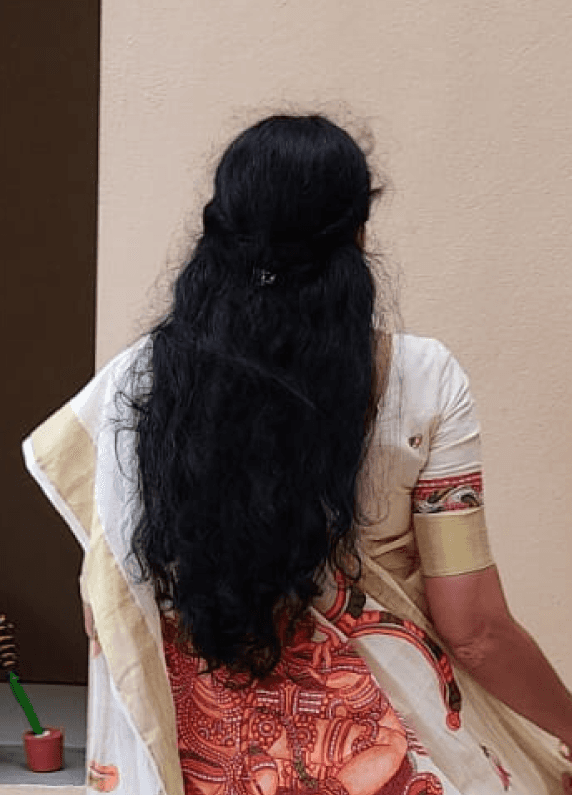 Black and white portrait of a woman with a blurred background