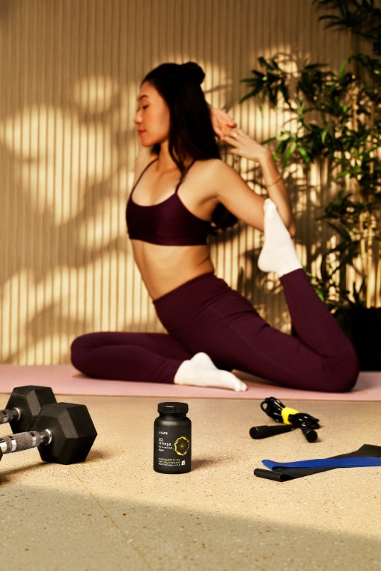 CNTH's model shot of a supplement jar, dumbbells and a skipping rope