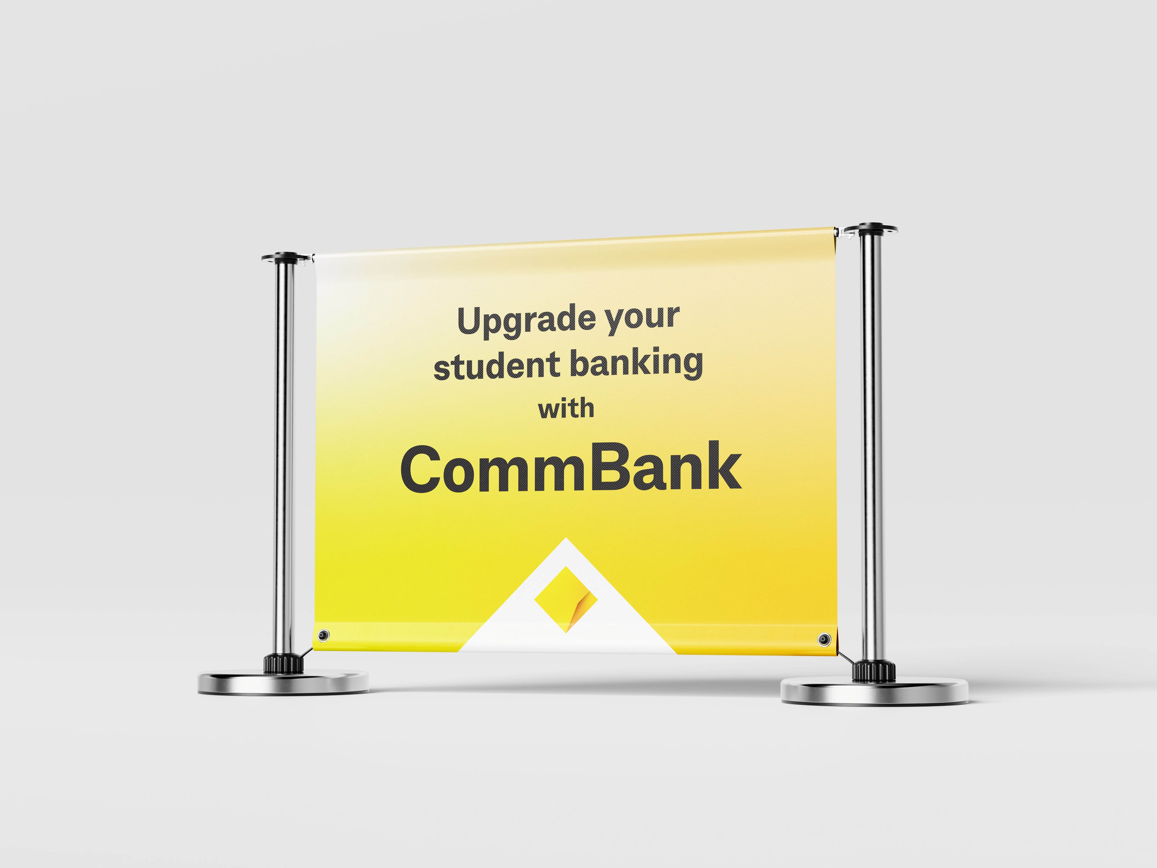 Modern home office setup with a monitor, ergonomic chair, keyboard, and indoor plants near a window with blinds.