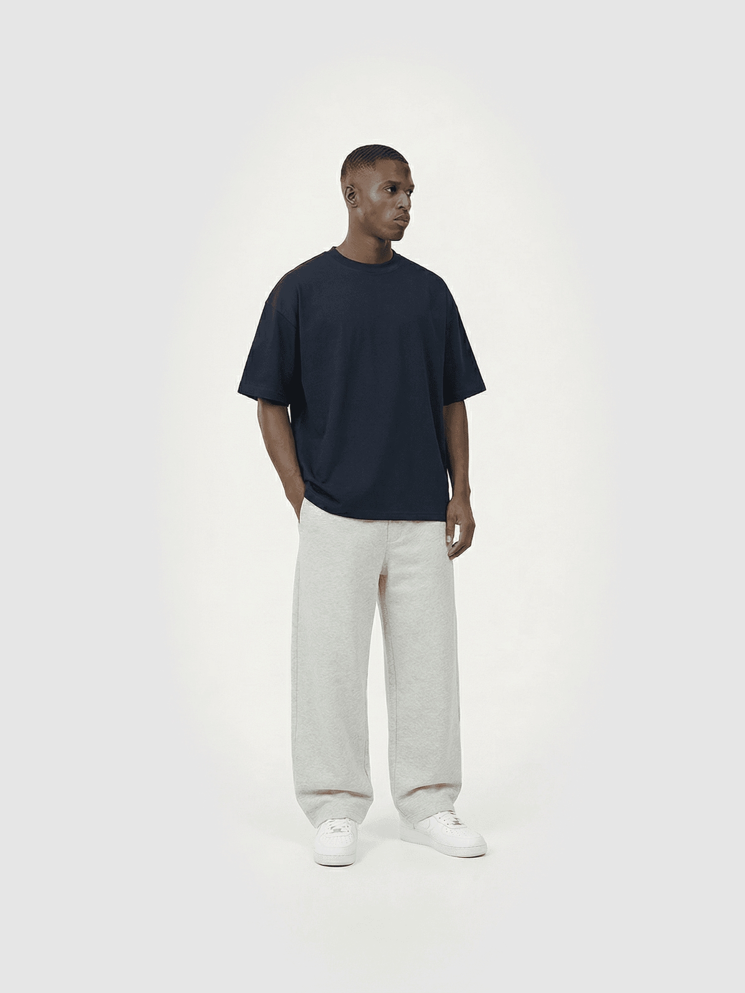 Heavyweight classic crew T-shirt in navy — front view on model.