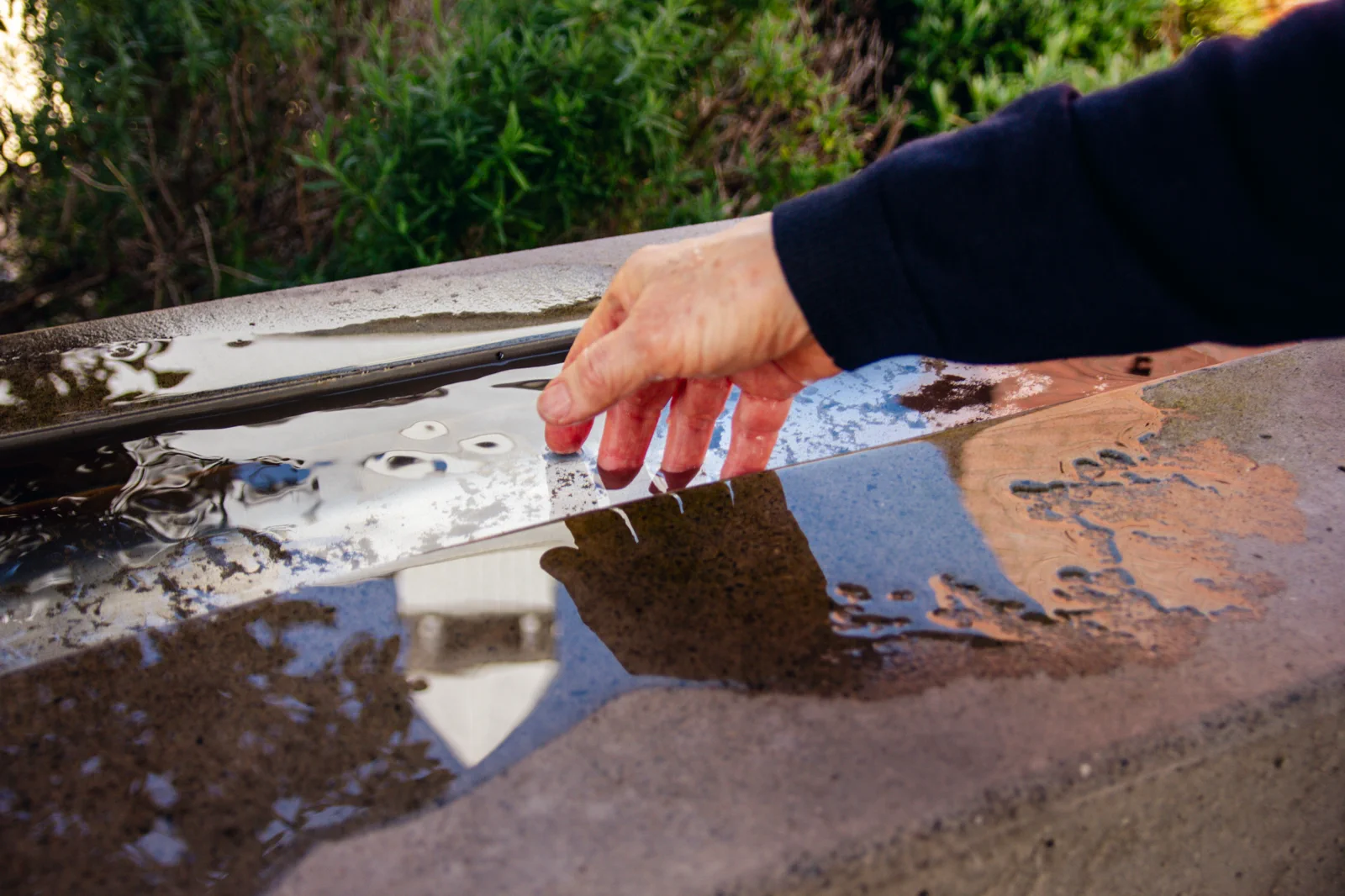 Hand cleaning a stone surface