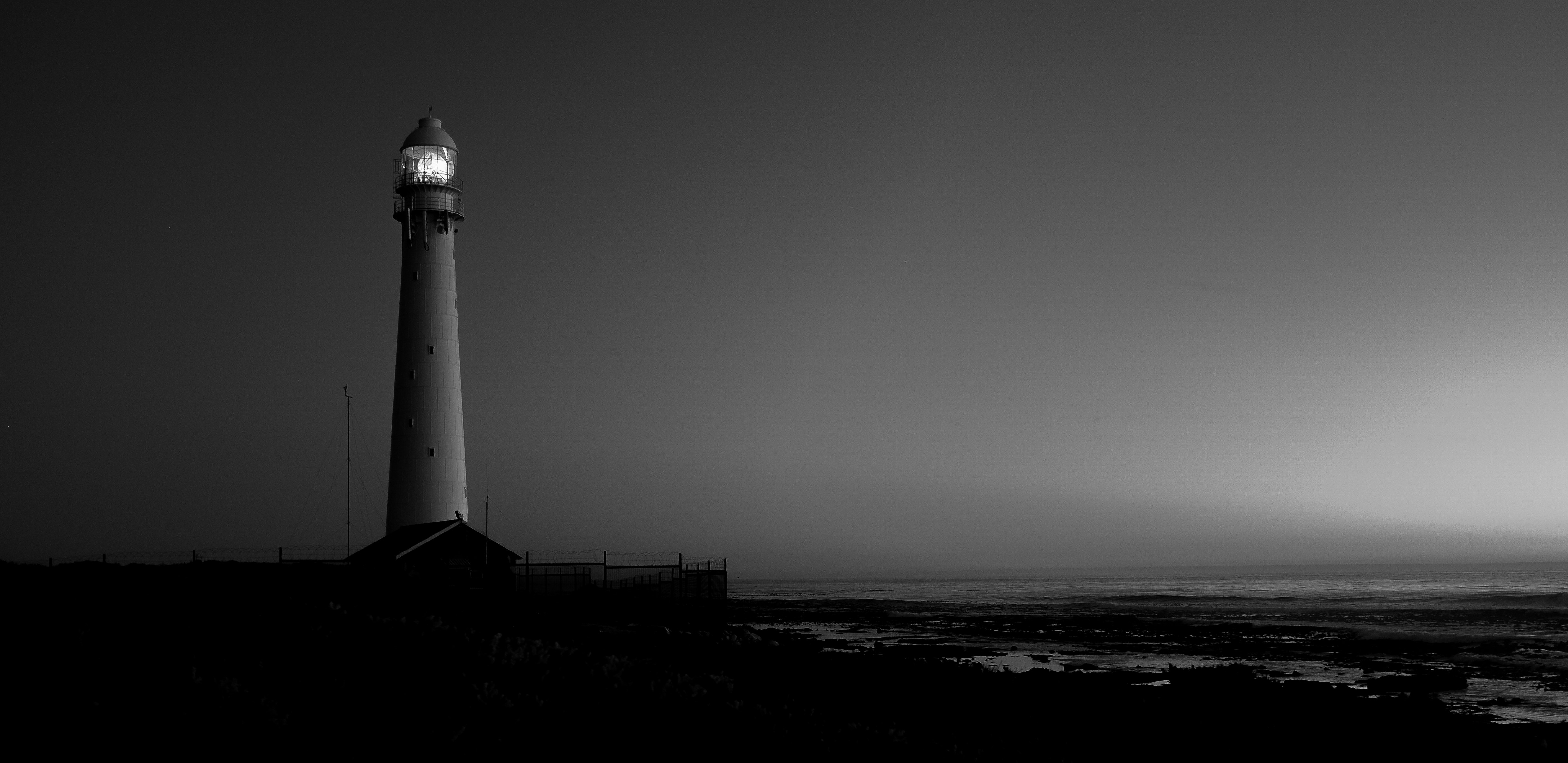 grayscale photo of lighthouse