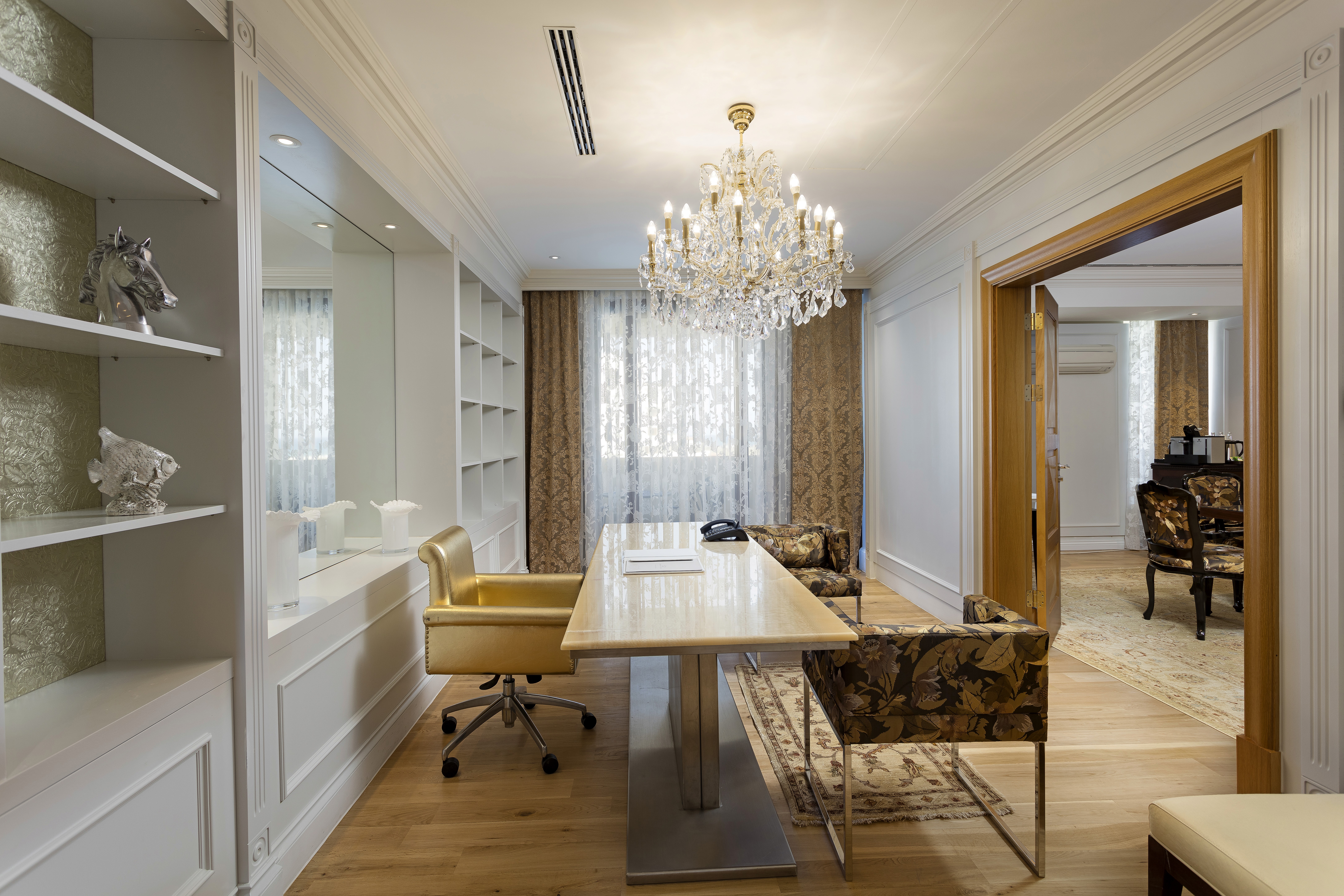 Private dining and transition area, reflecting the suite’s generous layout and seamless flow between spaces.