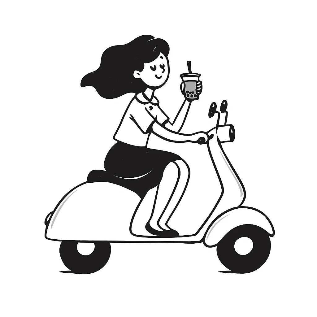 clear drinking glass with coffee on top of white table