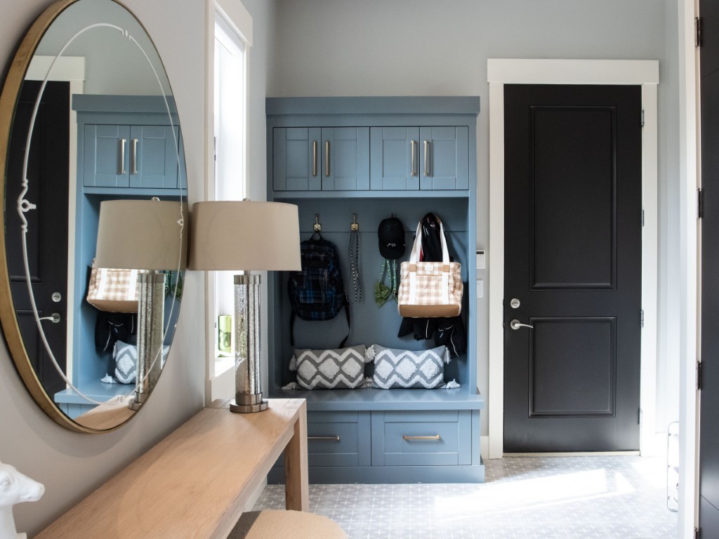 Image of Mudroom with built-in storage, furniture, and layout design by KHD Homes for home improvement and renovations.